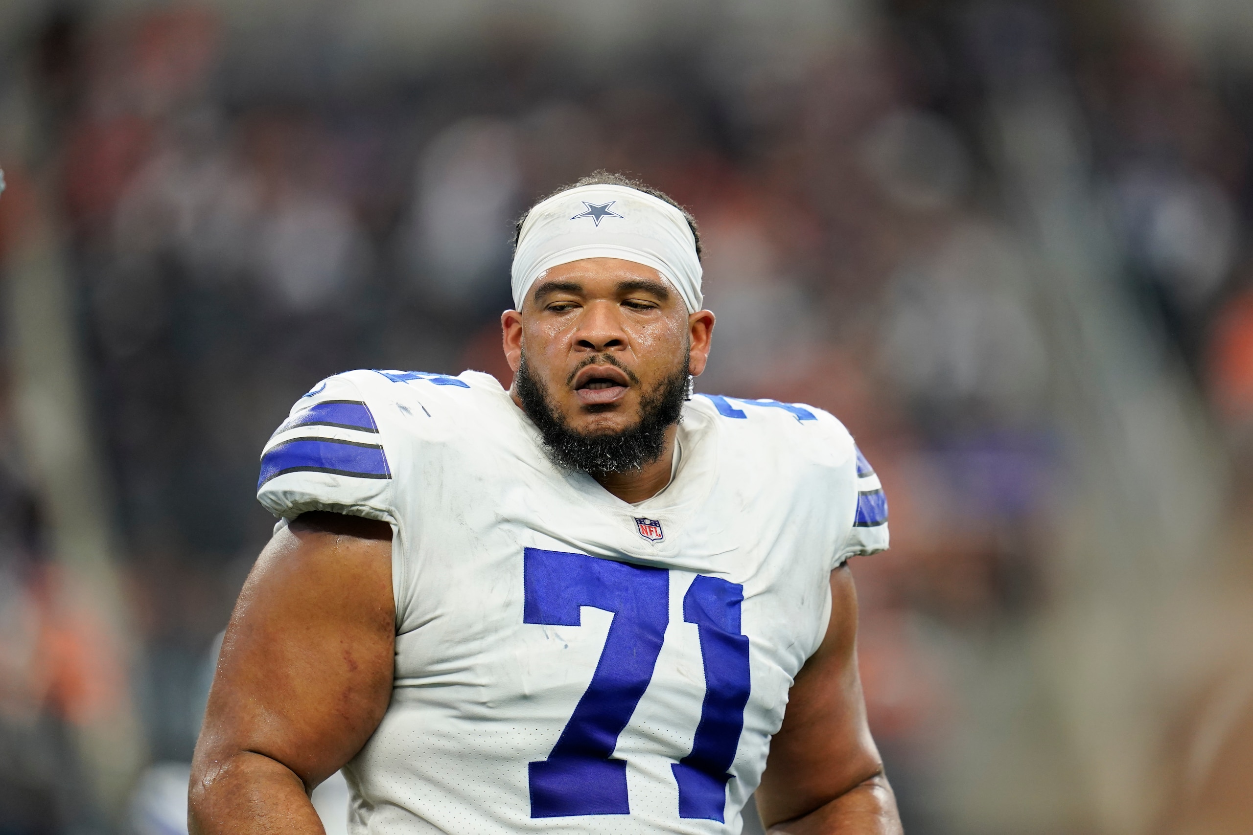 Dallas Cowboys offensive lineman La'el Collins (71) walks to the sideline during an NFL football game against the Denver Broncos, Sunday, Nov. 7, 2021, in Arlington, Texas. (AP Photo/Matt Patterson)