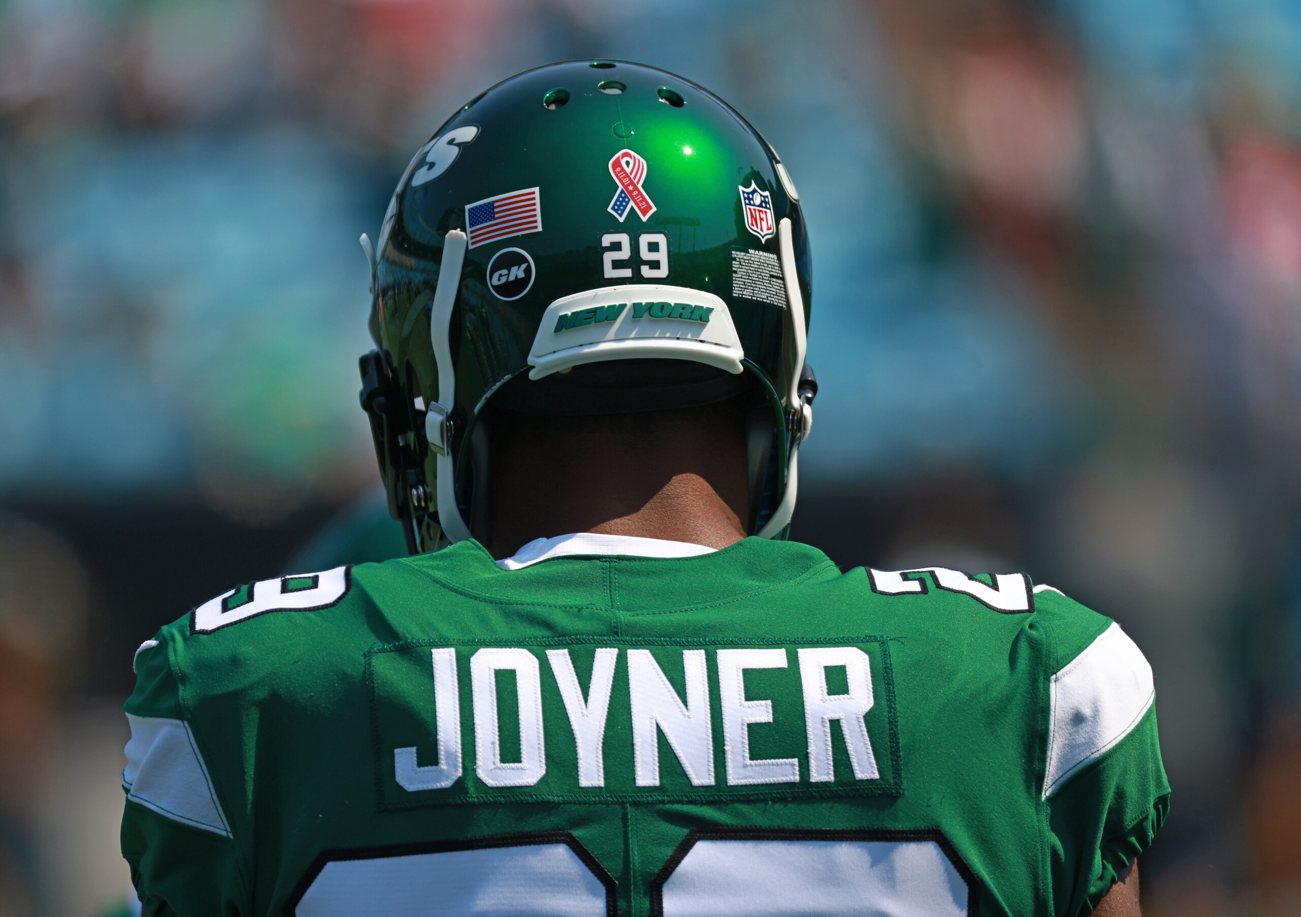 CHARLOTTE, NORTH CAROLINA - SEPTEMBER 12: A special logo honoring the September 11th victims is seen on the back Lamarcus Joyner #29 of the New York Jets prior to his game against the Carolina Panthers at Bank of America Stadium on September 12, 2021 in Charlotte, North Carolina. (Photo by Grant Halverson/Getty Images) CHARLOTTE, NORTH CAROLINA - SEPTEMBER 12: A special logo honoring the September 11th victims is seen on the back Lamarcus Joyner #29 of the New York Jets prior to his game against the Carolina Panthers at Bank of America Stadium on September 12, 2021 in Charlotte, North Carolina. (Photo by Grant Halverson/Getty Images)