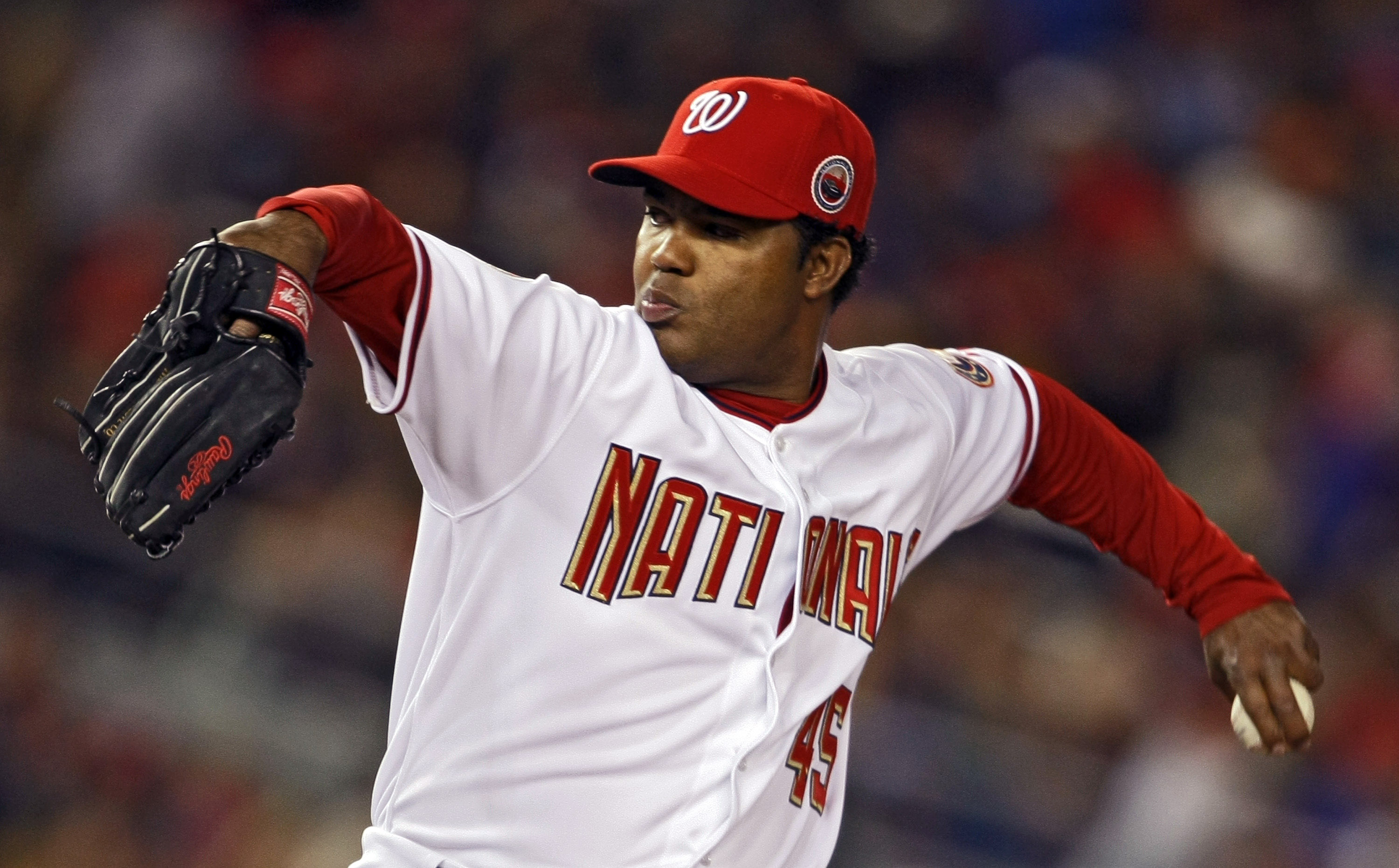 WASHINGTON - MARCH 30: Odalis Perez #45 of the Washington Nationals throws a pitch during the game against the Atlanta Braves on opening day March 30, 2008 at Nationals Park in Washington, D.C. The Nationals won 3-2.  (Photo by Drew Hallowell/Getty Images)