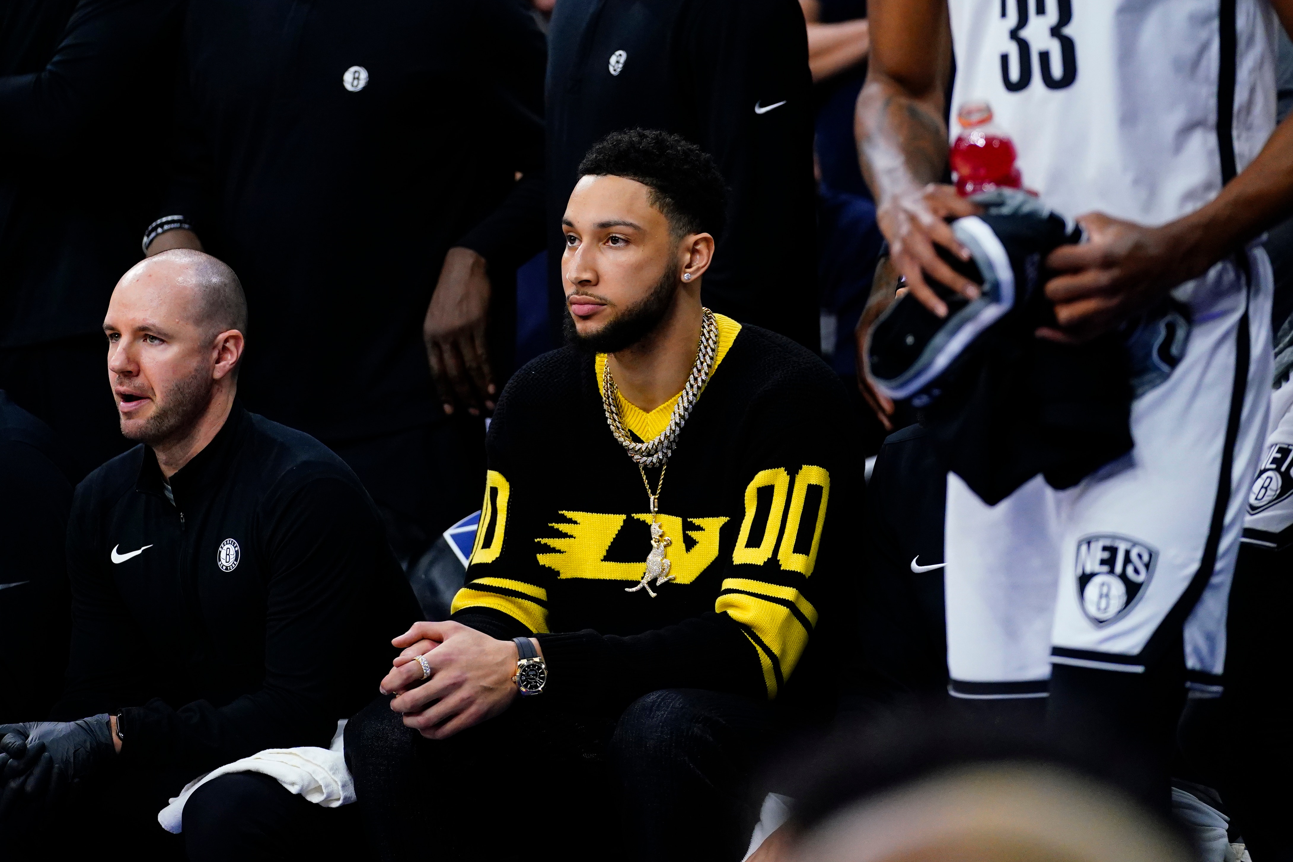 Brooklyn Nets' Ben Simmons watches during the first half of an NBA basketball gameagainst the Philadelphia 76ers, Thursday, March 10, 2022, in Philadelphia. (AP Photo/Matt Slocum)
