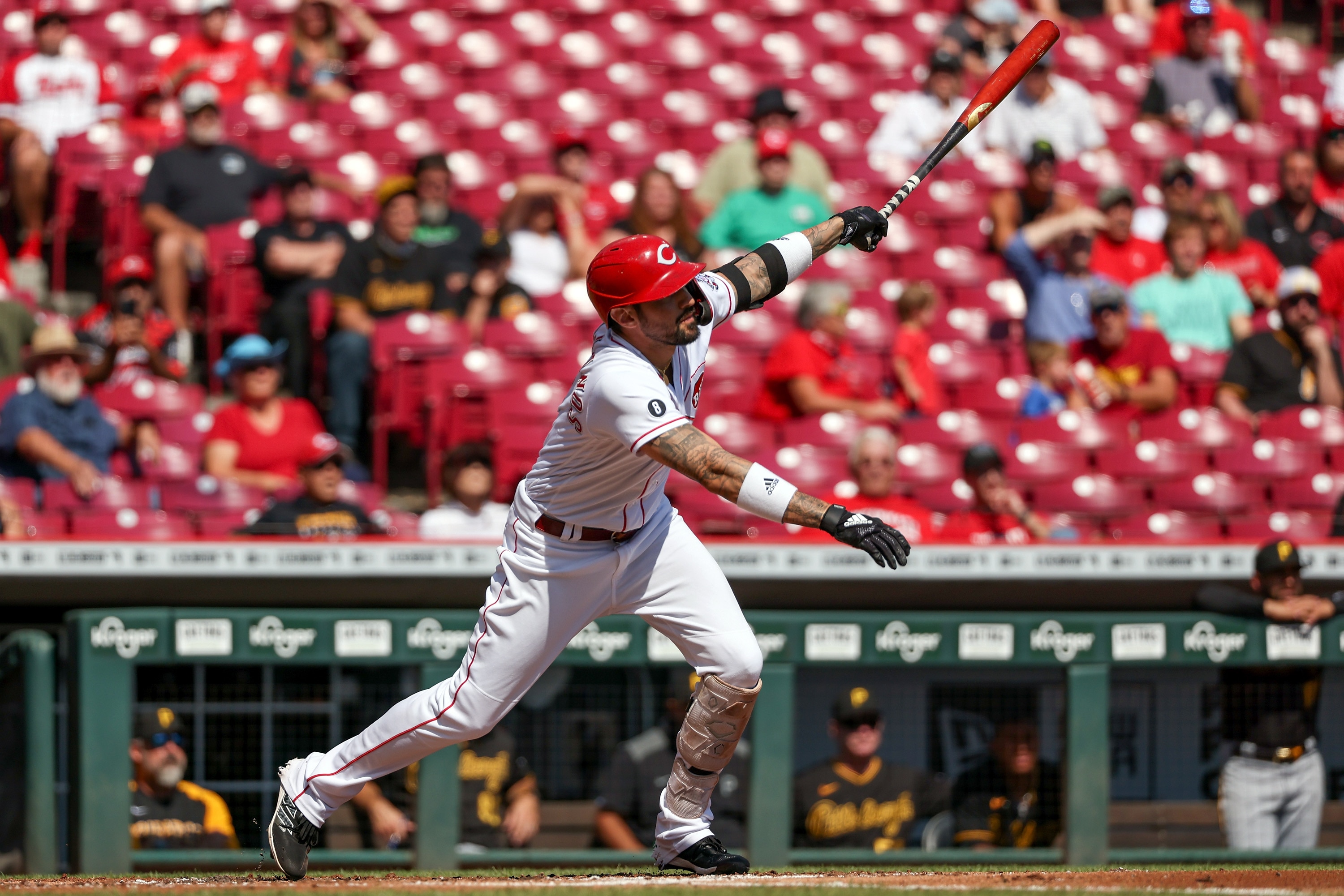 CINCINNATI, OHIO - SEPTEMBER 27: Nick Castellanos #2 of the Cincinnati Reds hits a sacrifice fly in the first inning against the Pittsburgh Pirates at Great American Ball Park on September 27, 2021 in Cincinnati, Ohio. (Photo by Dylan Buell/Getty Images)