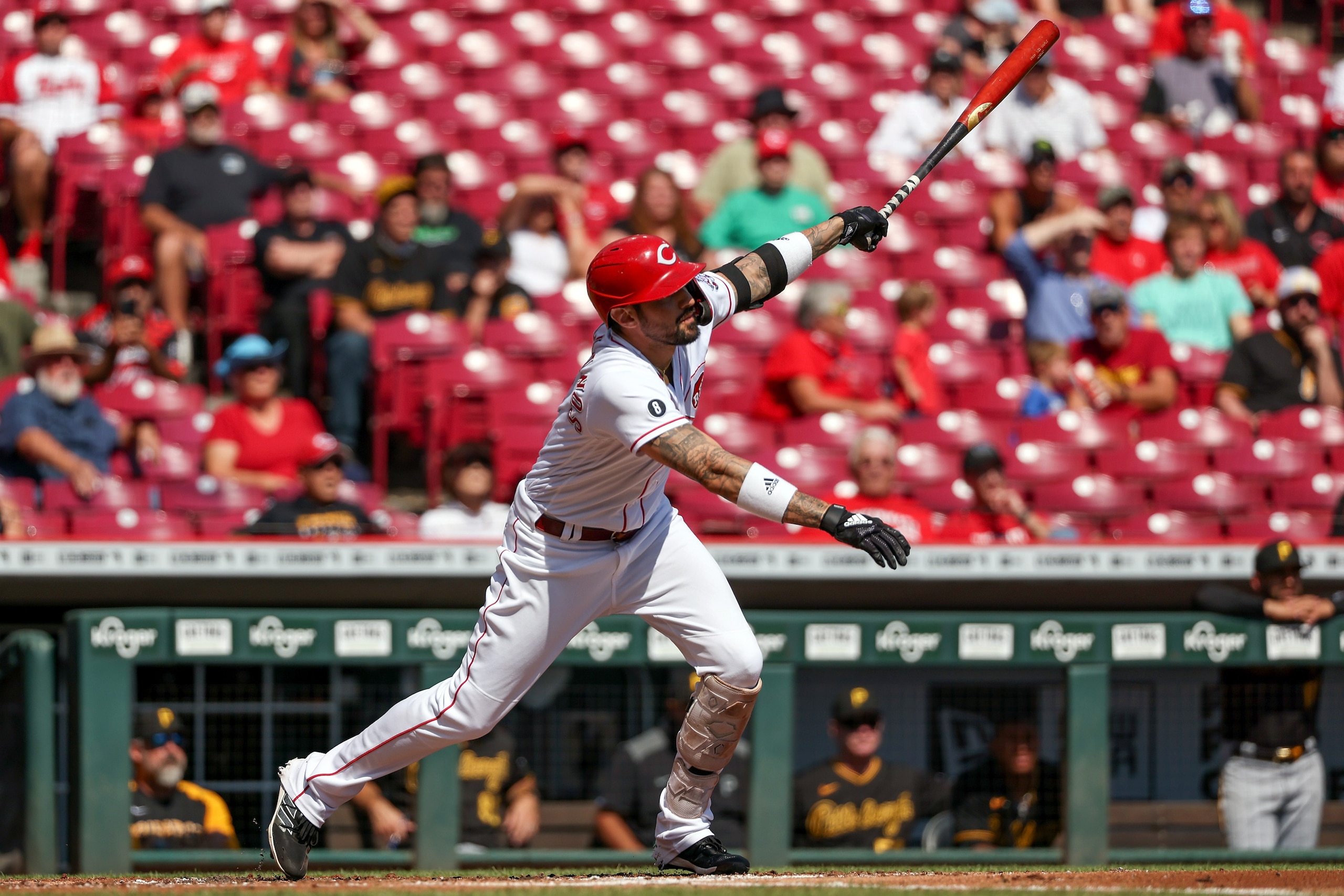 CINCINNATI, OHIO - SEPTEMBER 27: Nick Castellanos #2 of the Cincinnati Reds hits a sacrifice fly in the first inning against the Pittsburgh Pirates at Great American Ball Park on September 27, 2021 in Cincinnati, Ohio. (Photo by Dylan Buell/Getty Images)
