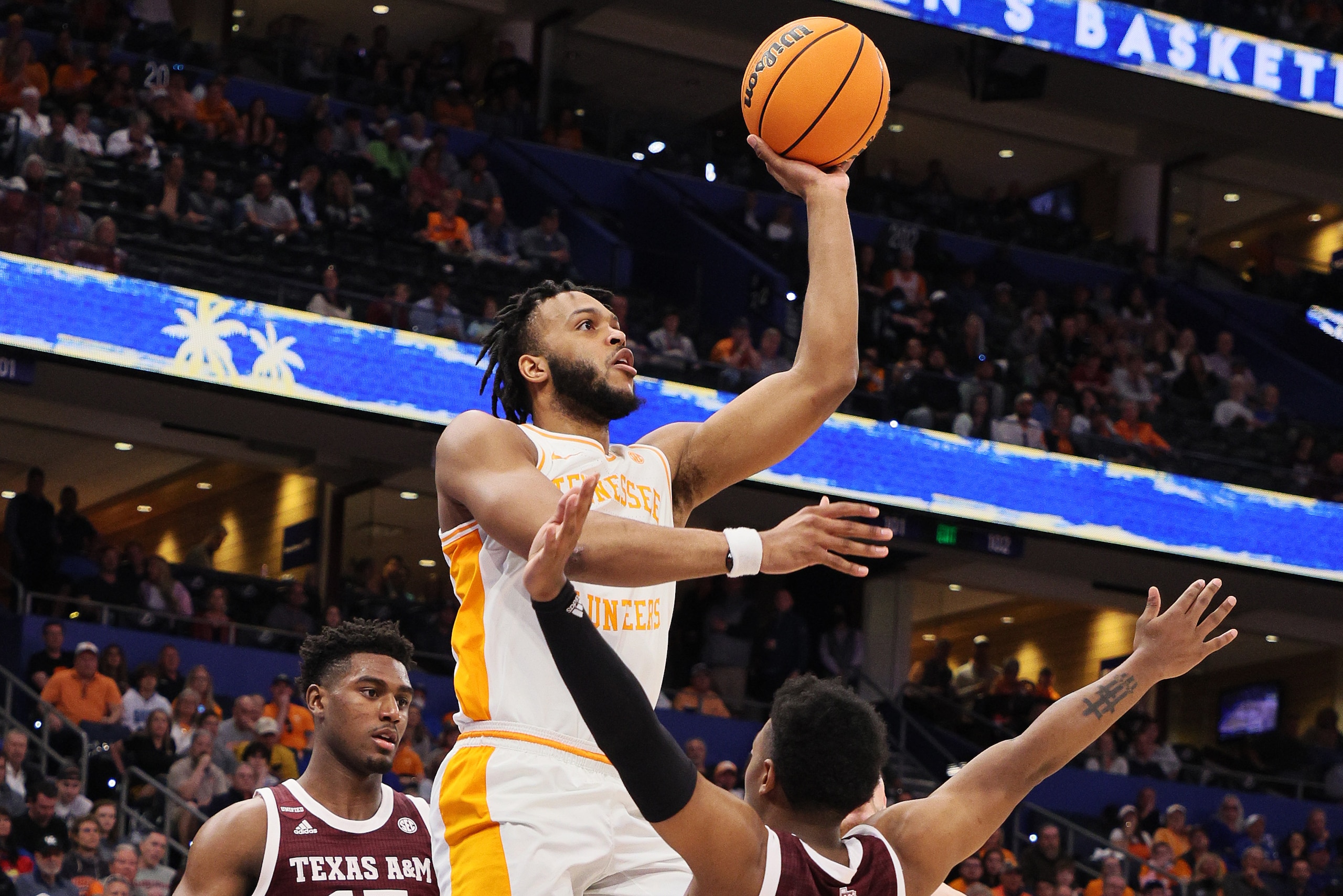 TAMPA, FLORIDA - MARCH 13: Josiah-Jordan James #30 of the Tennessee Volunteers shoots in the first half against the Texas A&M Aggies in the Championship game of the SEC Men's Tournament at Amalie Arena on March 13, 2022 in Tampa, Florida. (Photo by Andy Lyons/Getty Images)
