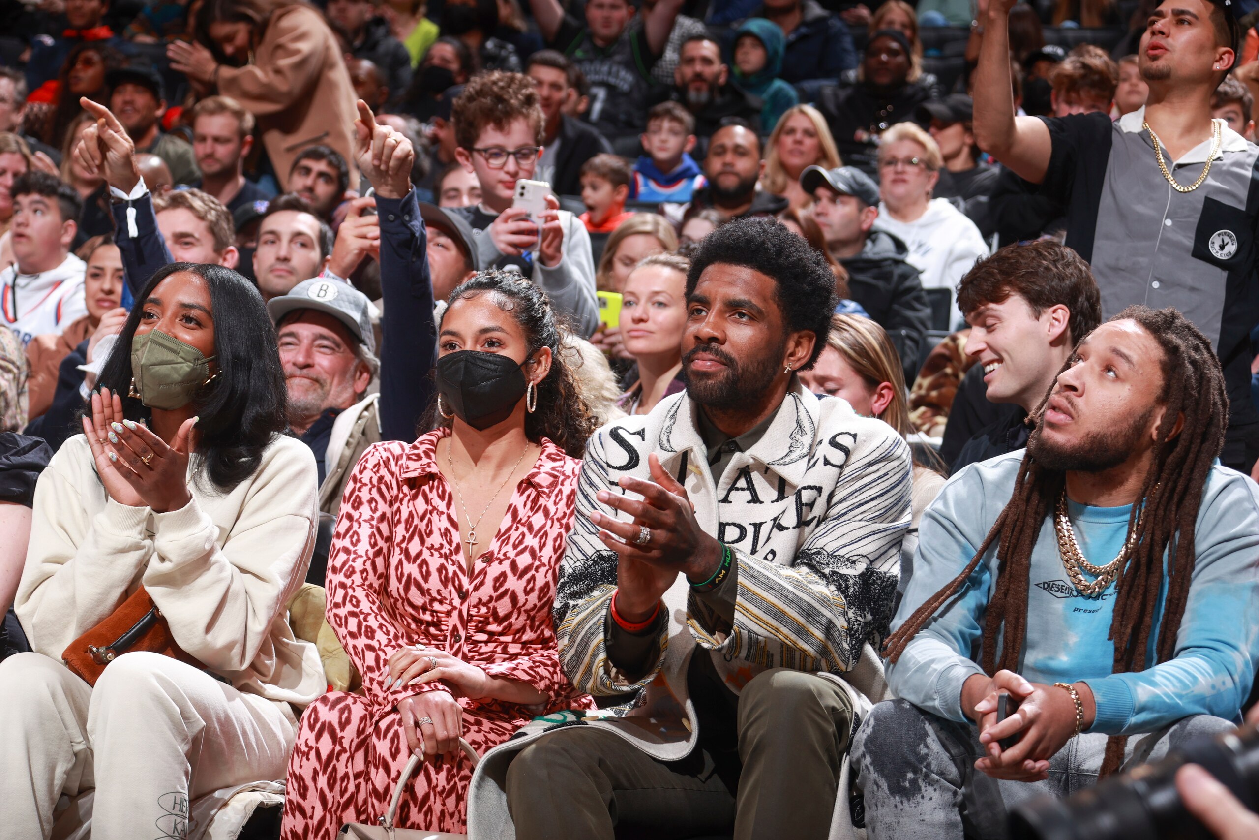 BROOKLYN, NY - MARCH 13: Kyrie Irving #11 of the Brooklyn Nets attends a game against the New York Knicks on March 13, 2022 at Barclays Center in Brooklyn, New York. NOTE TO USER: User expressly acknowledges and agrees that, by downloading and or using this Photograph, user is consenting to the terms and conditions of the Getty Images License Agreement. Mandatory Copyright Notice: Copyright 2022 NBAE (Photo by Nathaniel S. Butler/NBAE via Getty Images)