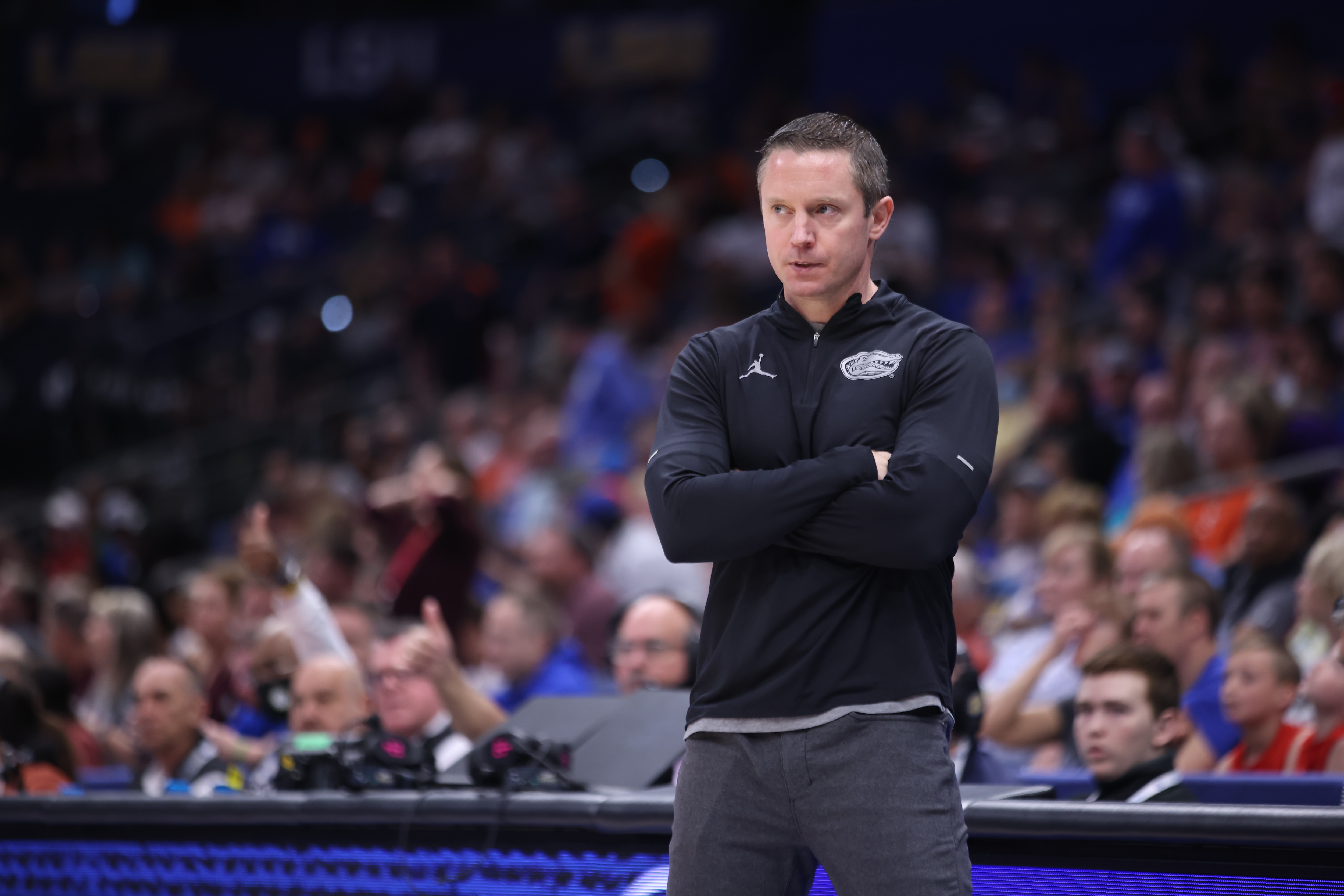 TAMPA, FL - MARCH 10: Florida Gators head coach Mike White watches the action during the SEC Tournament between the Florida Gators (#9) and the Texas A&M Aggies (#8) on Thursday, March 10, 2022 at the Amalie Arena in Tampa, FL (Photo by Peter Joneleit/Icon Sportswire via Getty Images) TAMPA, FL - MARCH 10: Florida Gators head coach Mike White watches the action during the SEC Tournament between the Florida Gators (#9) and the Texas A&M Aggies (#8) on Thursday, March 10, 2022 at the Amalie Arena in Tampa, FL (Photo by Peter Joneleit/Icon Sportswire via Getty Images)