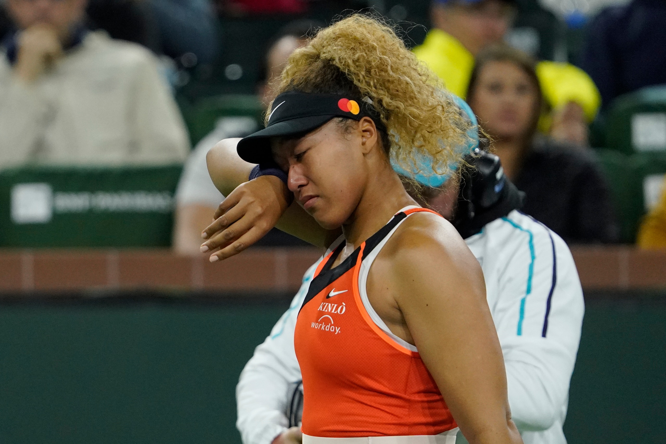 Naomi Osaka, of Japan, reacts to a comment from a spectator during her match against Veronika Kudermetova, of Russia, at the BNP Paribas Open tennis tournament Saturday, March 12, 2022, in Indian Wells, Calif. (AP Photo/Mark J. Terrill)