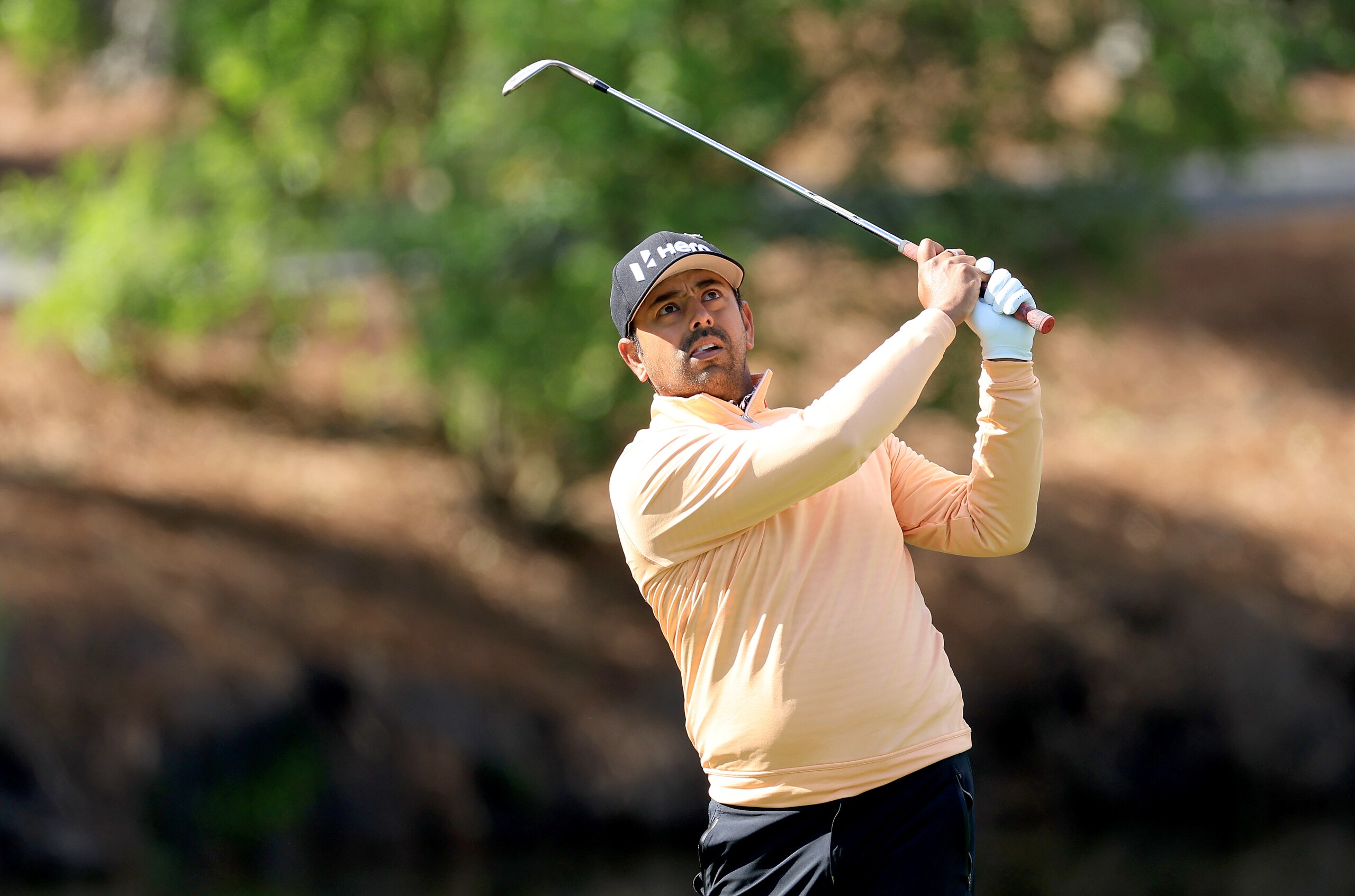 PONTE VEDRA BEACH, FLORIDA - MARCH 13: Anirban Lahiri of India plays his third shot on the par 4, seventh hole during the weather delayed completion of the second round of THE PLAYERS Championship at TPC Sawgrass on March 13, 2022 in Ponte Vedra Beach, Florida. (Photo by David Cannon/Getty Images)