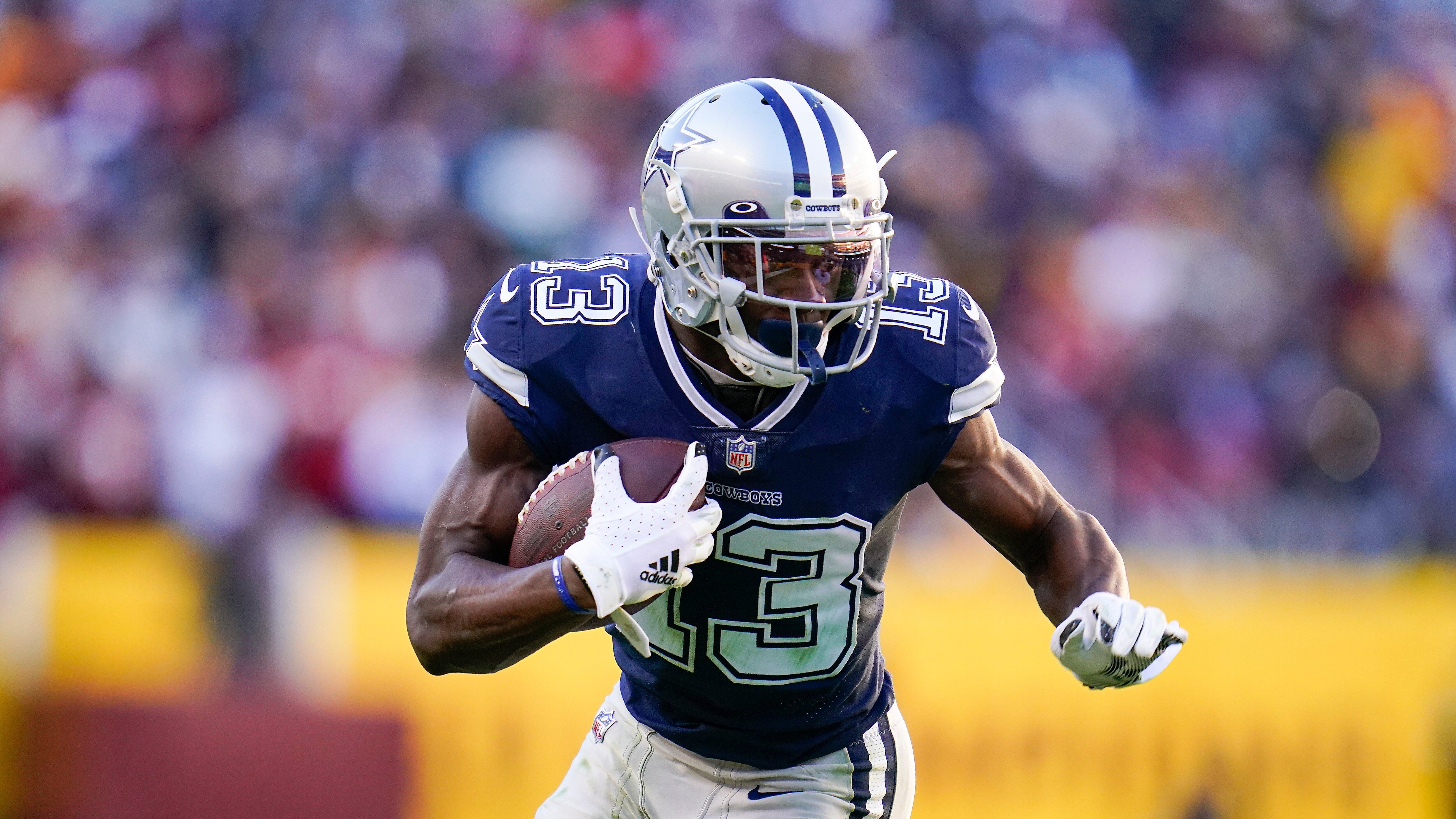 Dallas Cowboys wide receiver Michael Gallup catches a pass against the Washington Football Team during the second half of an NFL football game, Sunday, Dec. 12, 2021, in Landover, Md. (AP Photo/Julio Cortez)
