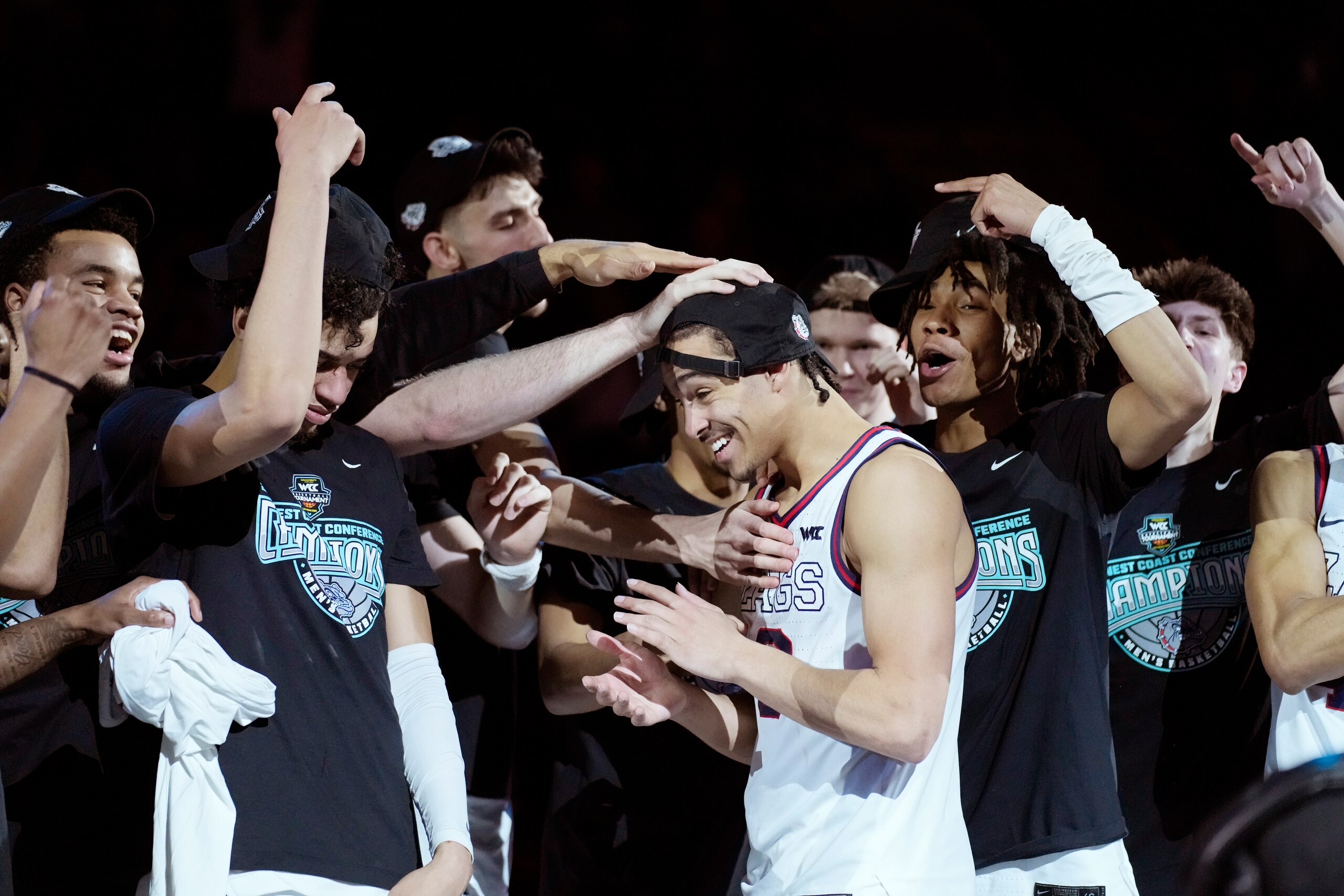 Gonzaga players celebrate after defeating Saint Mary's in an NCAA college basketball championship game at the West Coast Conference tournament Tuesday, March 8, 2022, in Las Vegas. (AP Photo/John Locher)