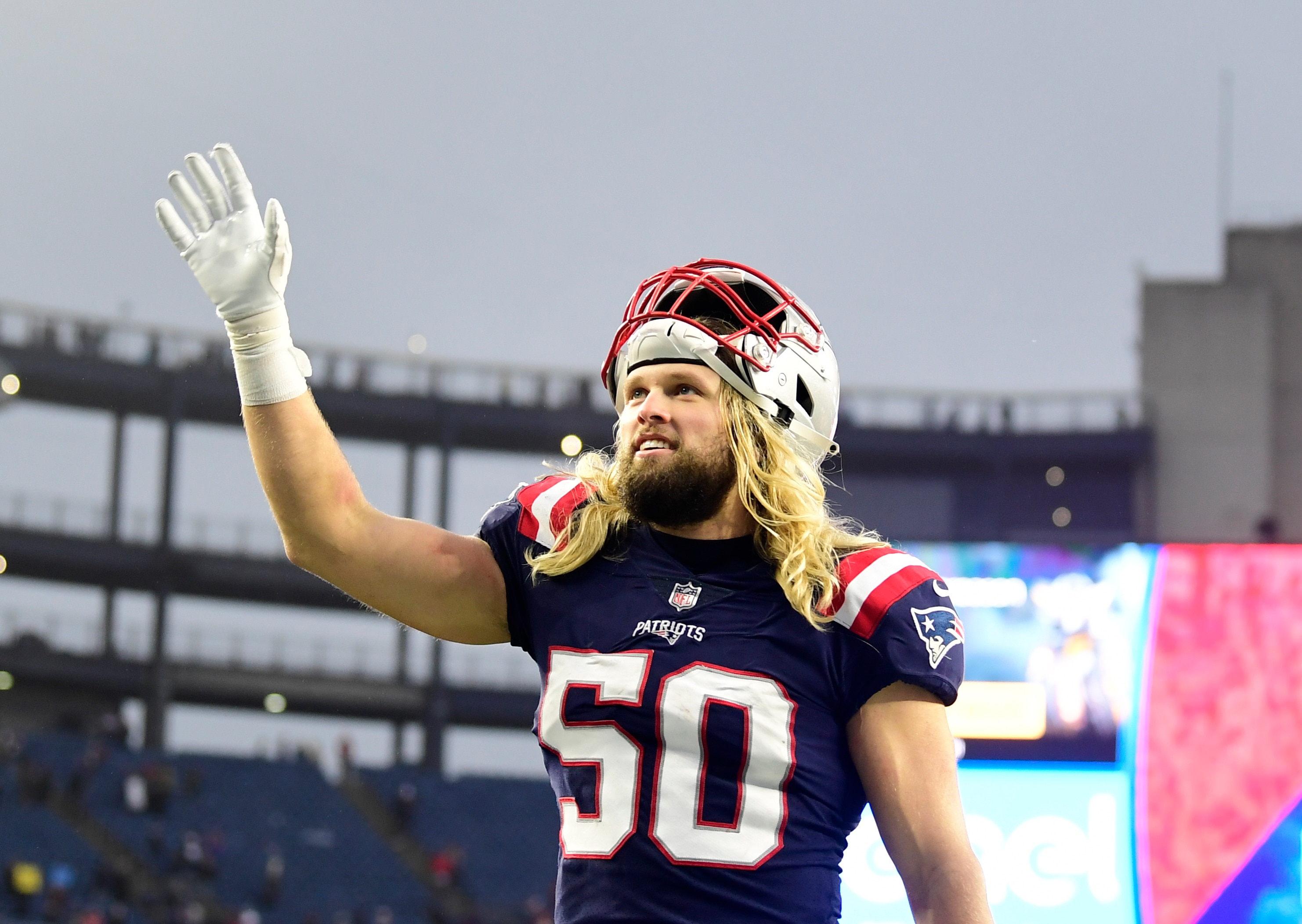 FOXBOROUGH, MASSACHUSETTS - JANUARY 02: Chase Winovich #50 of the New England Patriots leaves the field after defeating the Jacksonville Jaguars 50-10 at Gillette Stadium on January 02, 2022 in Foxborough, Massachusetts. (Photo by Maddie Malhotra/Getty Images)
