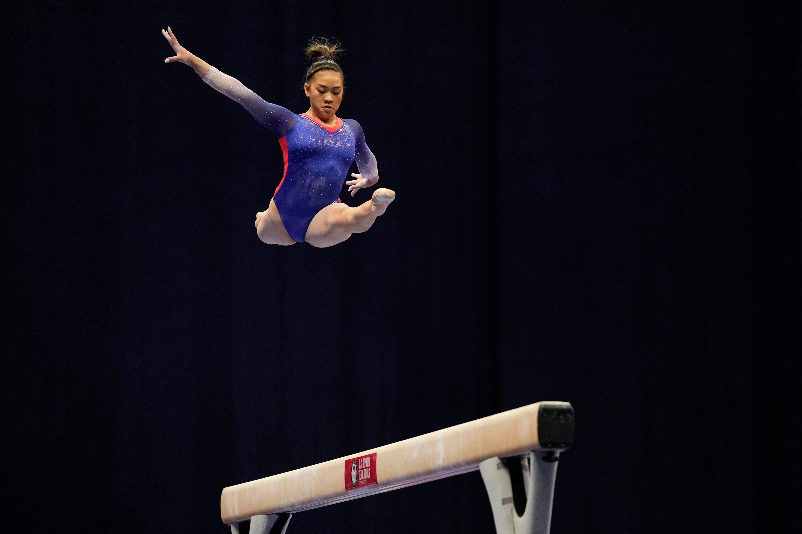 Suni Lee competes on the balance beam during the women's U.S. Olympic Gymnastics Trials Friday, June 25, 2021, in St. Louis. (AP Photo/Jeff Roberson)