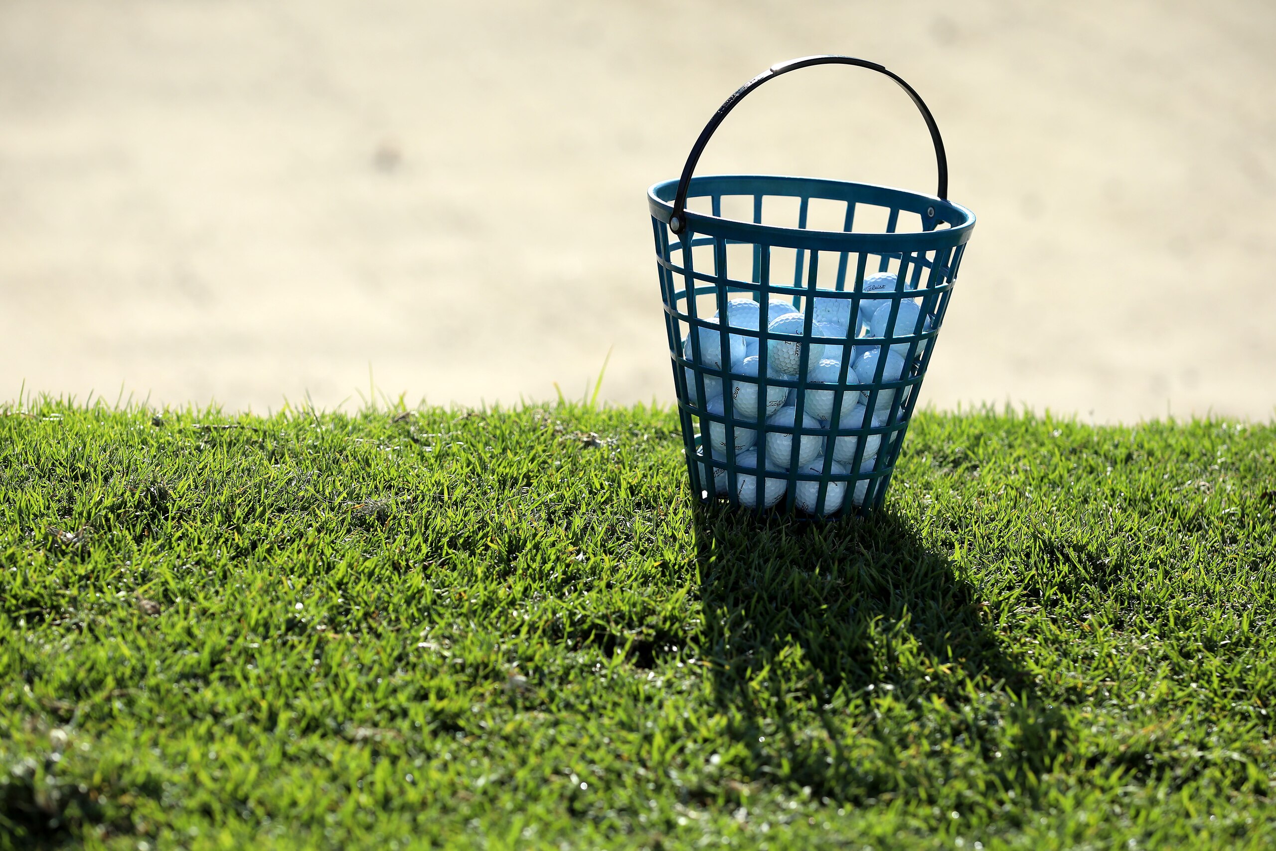 NEWPORT BEACH, CALIFORNIA - MARCH 06: A general view of golf balls near a bunker during the final round at Newport Beach Country Club on March 06, 2022 in Newport Beach, California. (Photo by Katelyn Mulcahy/Getty Images)