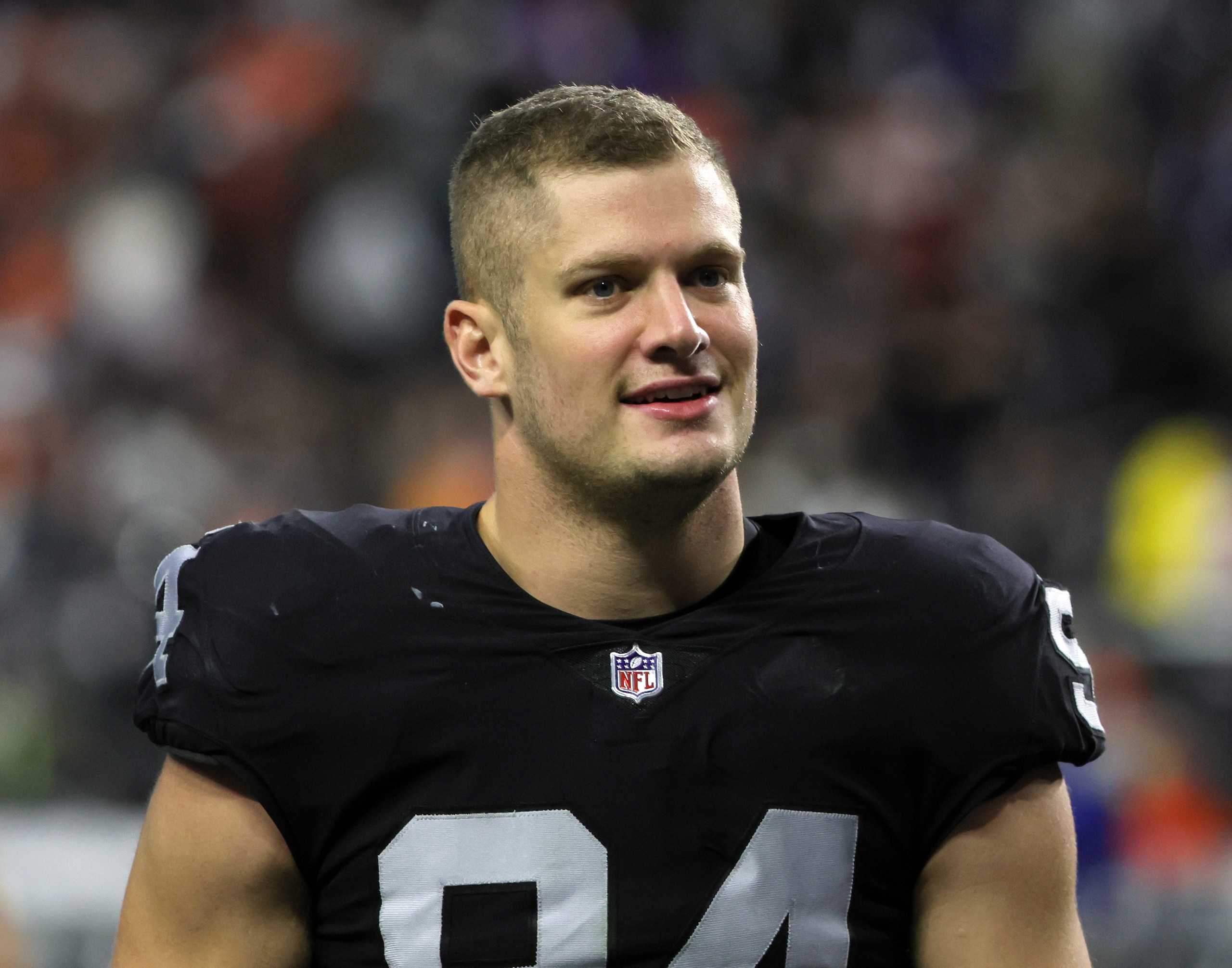 LAS VEGAS, NEVADA - DECEMBER 26: Defensive end Carl Nassib #94 of the Las Vegas Raiders walks off the field after the team's 17-13 victory over the Denver Broncos at Allegiant Stadium on December 26, 2021 in Las Vegas, Nevada. (Photo by Ethan Miller/Getty Images) LAS VEGAS, NEVADA - DECEMBER 26: Defensive end Carl Nassib #94 of the Las Vegas Raiders walks off the field after the team's 17-13 victory over the Denver Broncos at Allegiant Stadium on December 26, 2021 in Las Vegas, Nevada. (Photo by Ethan Miller/Getty Images)