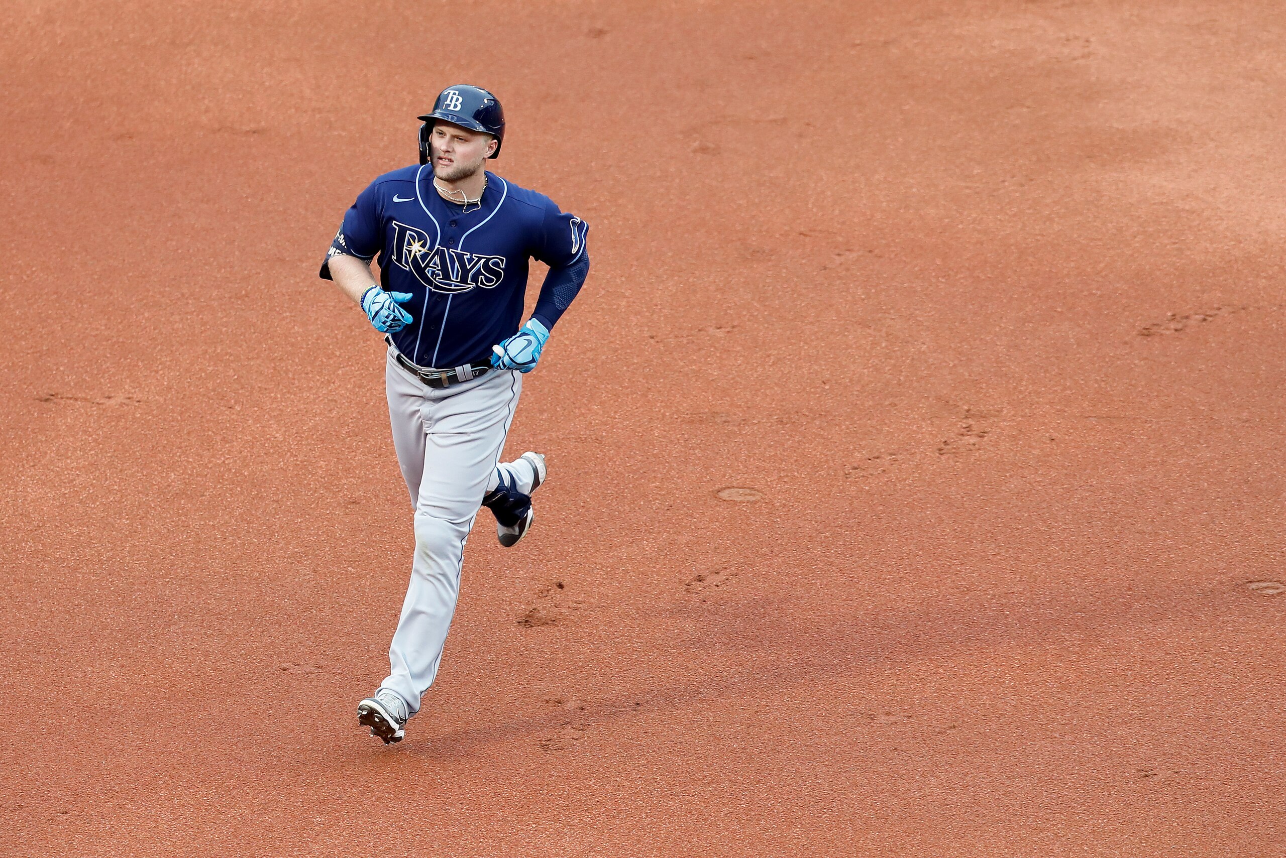 Tampa Bay Rays' Austin Meadows rounds the bases after hitting a two-run home run against the Boston Red Sox during the first inning during game 3 of a baseball American League Division Series, Sunday, Oct. 10, 2021, in Boston. (AP Photo/Michael Dwyer)