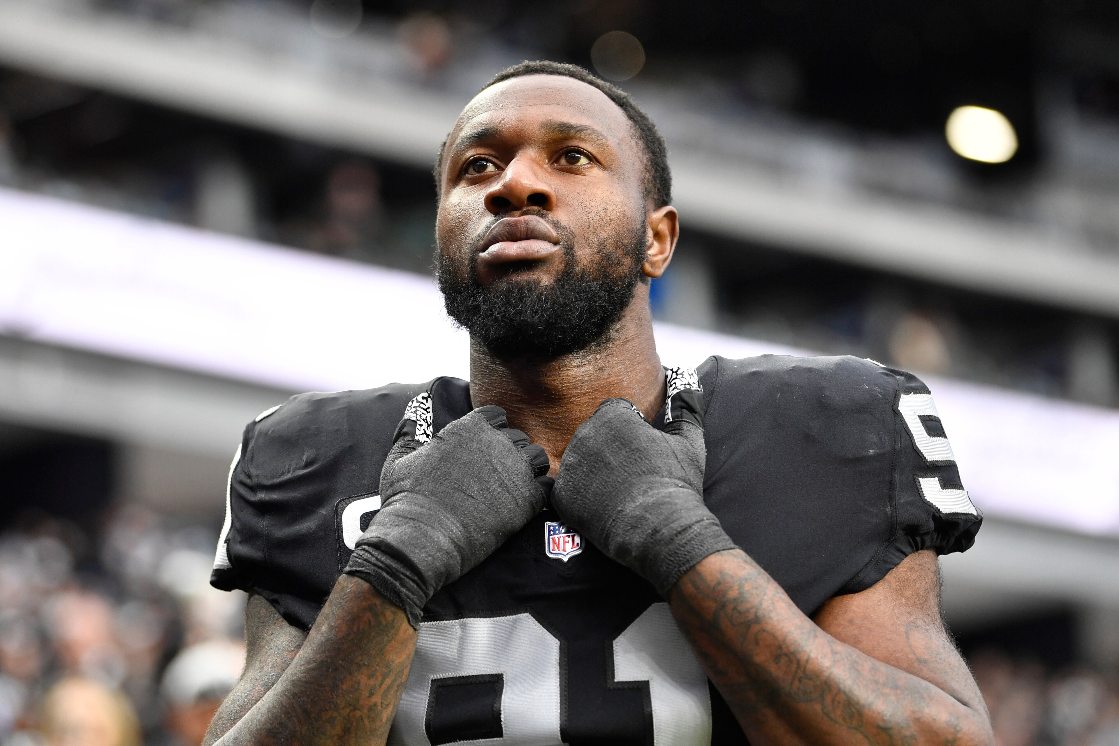 LAS VEGAS, NEVADA - DECEMBER 05: Defensive end Yannick Ngakoue #91 of the Las Vegas Raiders prepares to take the field before a game against the Washington Football Team at Allegiant Stadium on December 05, 2021 in Las Vegas, Nevada. The Washington Football Team defeated the Raiders 17-15. (Photo by Chris Unger/Getty Images) LAS VEGAS, NEVADA - DECEMBER 05: Defensive end Yannick Ngakoue #91 of the Las Vegas Raiders prepares to take the field before a game against the Washington Football Team at Allegiant Stadium on December 05, 2021 in Las Vegas, Nevada. The Washington Football Team defeated the Raiders 17-15. (Photo by Chris Unger/Getty Images)