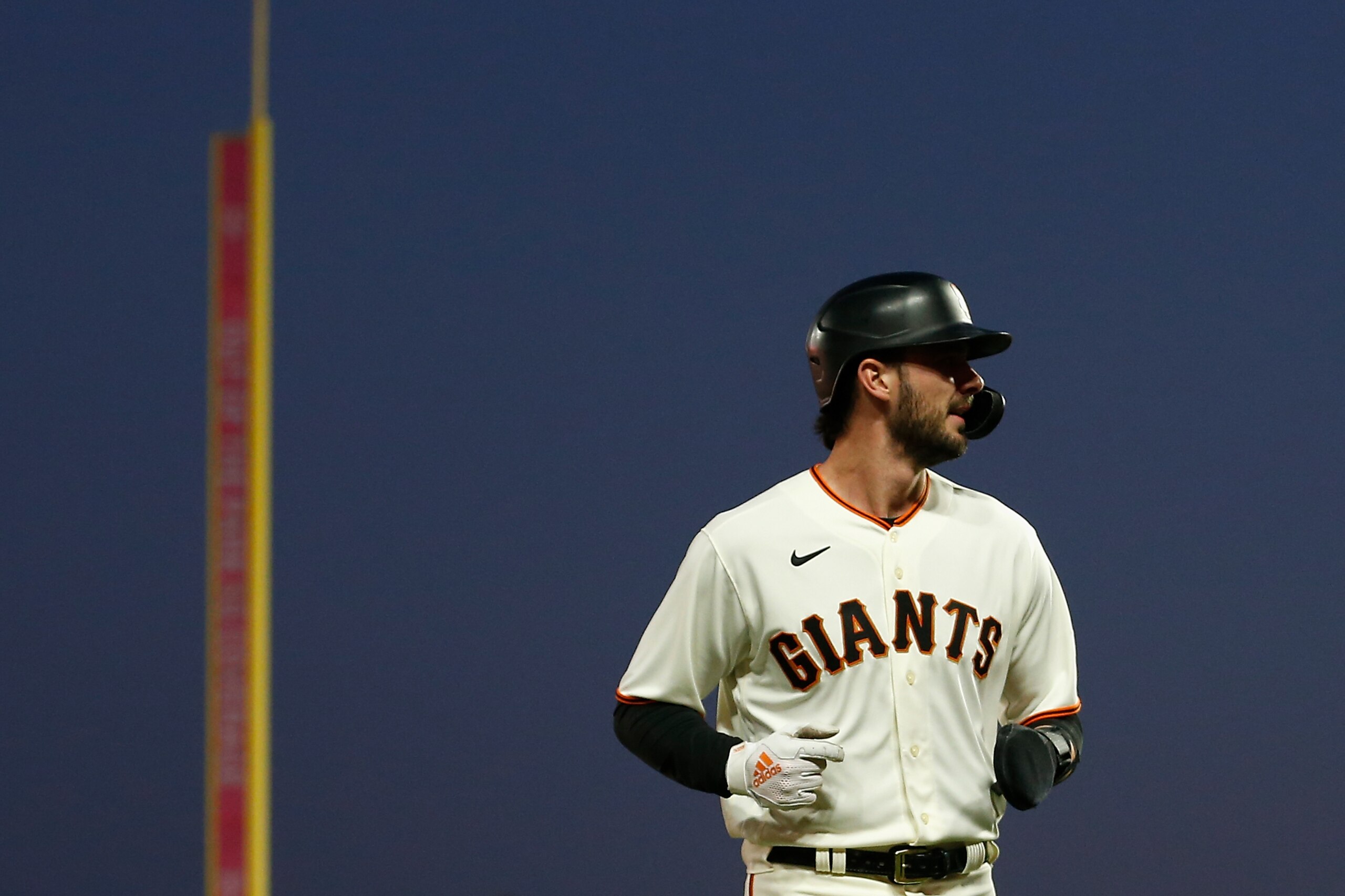 SAN FRANCISCO, CA - OCTOBER 14: Kris Bryant #23 of the San Francisco Giants walks to the dugout during Game 5 of the NLDS between the Los Angeles Dodgers and the San Francisco Giants at Oracle Park on Thursday, October 14, 2021 in San Francisco, California. (Photo by Lachlan Cunningham/MLB Photos via Getty Images)