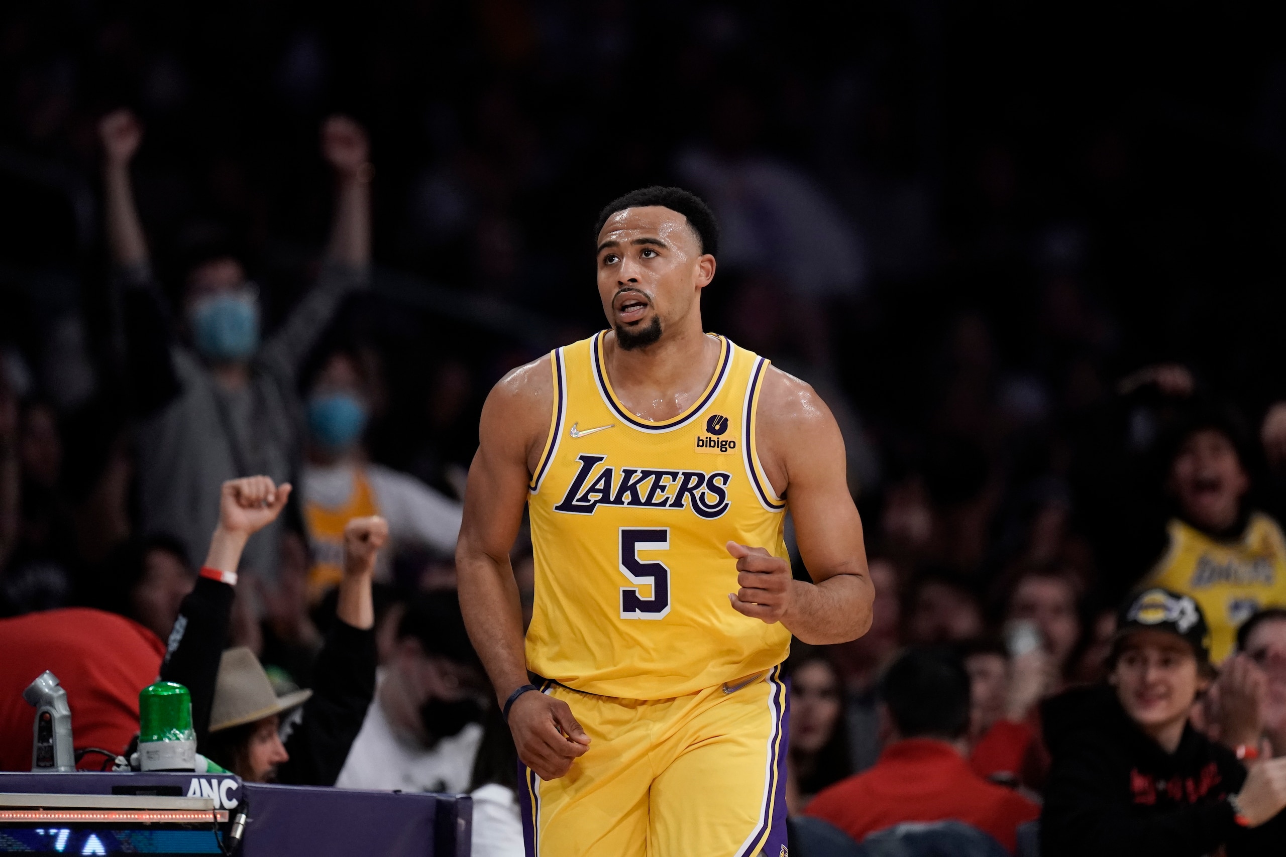 Los Angeles Lakers' Talen Horton-Tucker makes his way down the court during second half of an NBA basketball game against the Toronto Raptors Monday, March 14, 2022, in Los Angeles. (AP Photo/Jae C. Hong) Los Angeles Lakers' Talen Horton-Tucker makes his way down the court during second half of an NBA basketball game against the Toronto Raptors Monday, March 14, 2022, in Los Angeles. (AP Photo/Jae C. Hong)