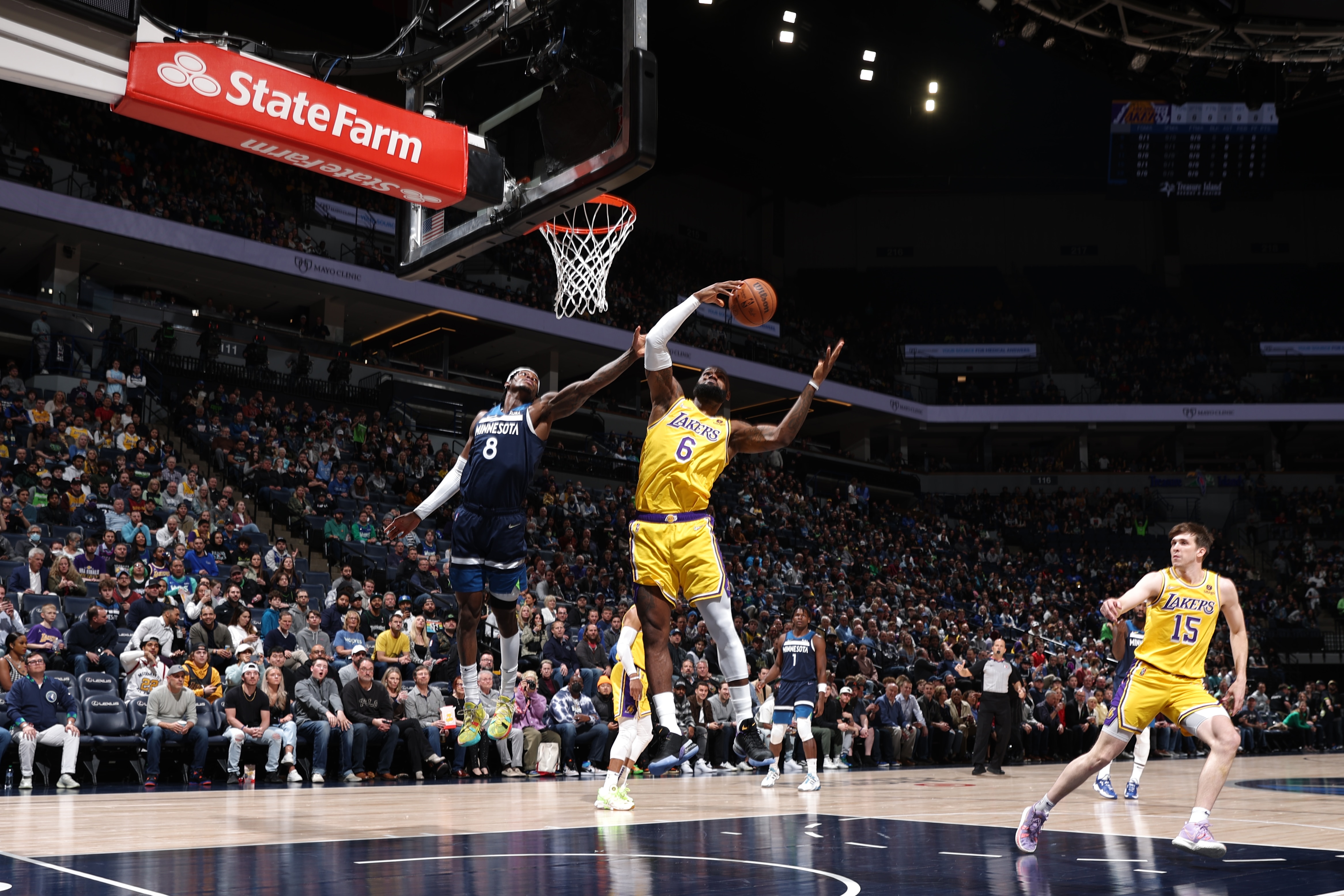MINNEAPOLIS, MN - MARCH 16: LeBron James #6 of the Los Angeles Lakers rebounds the ball during the game against the Minnesota Timberwolves on March 16, 2022 at Target Center in Minneapolis, Minnesota. NOTE TO USER: User expressly acknowledges and agrees that, by downloading and or using this Photograph, user is consenting to the terms and conditions of the Getty Images License Agreement. Mandatory Copyright Notice: Copyright 2022 NBAE (Photo by David Sherman/NBAE via Getty Images)