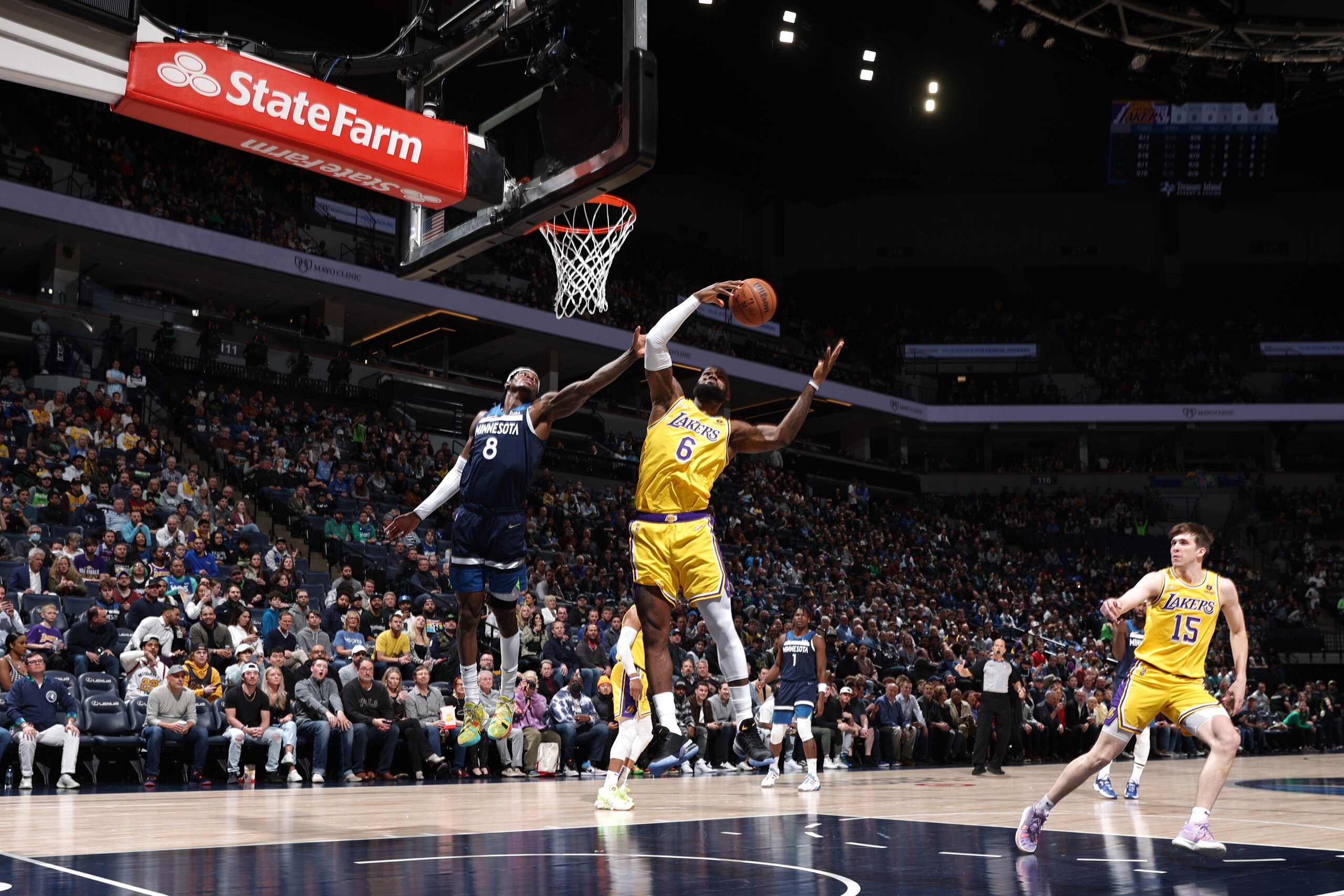MINNEAPOLIS, MN - MARCH 16: LeBron James #6 of the Los Angeles Lakers rebounds the ball during the game against the Minnesota Timberwolves on March 16, 2022 at Target Center in Minneapolis, Minnesota. NOTE TO USER: User expressly acknowledges and agrees that, by downloading and or using this Photograph, user is consenting to the terms and conditions of the Getty Images License Agreement. Mandatory Copyright Notice: Copyright 2022 NBAE (Photo by David Sherman/NBAE via Getty Images)