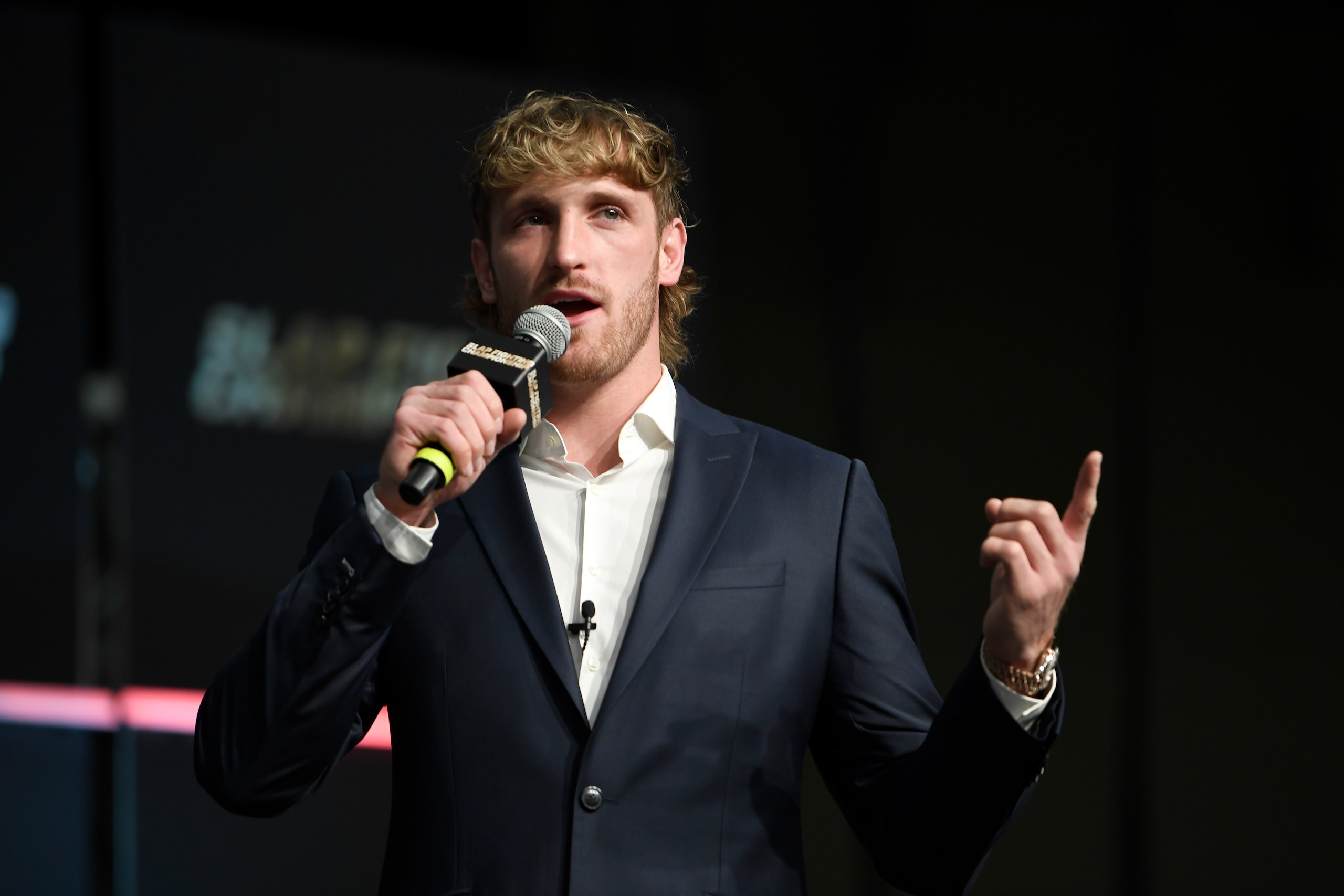 COLUMBUS, OHIO - MARCH 05:  Logan Pau speaks to fans during the Slap Fighting Championships at the Arnold Sports Festival in Columbus Convention Center on March 05, 2022 in Columbus, Ohio. (Photo by Gaelen Morse/Getty Images)