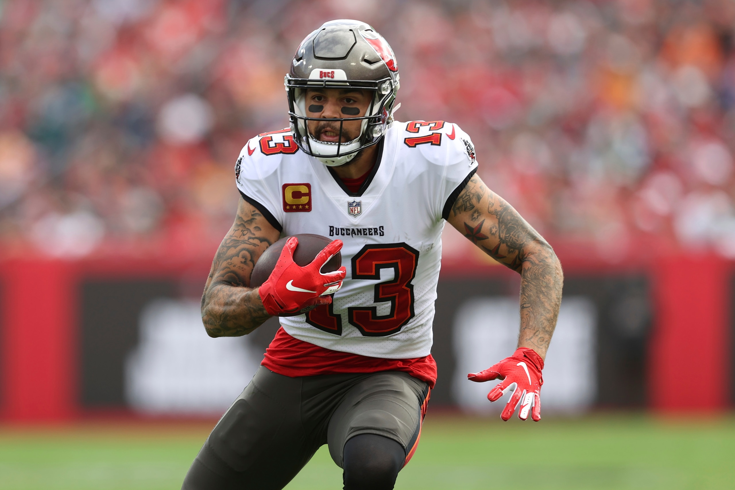 Tampa Bay Buccaneers wide receiver Mike Evans (13) after a catch against the Philadelphia Eagles during the first half of an NFL wild-card football game Sunday, Jan. 16, 2022, in Tampa, Fla. (AP Photo/Mark LoMoglio)