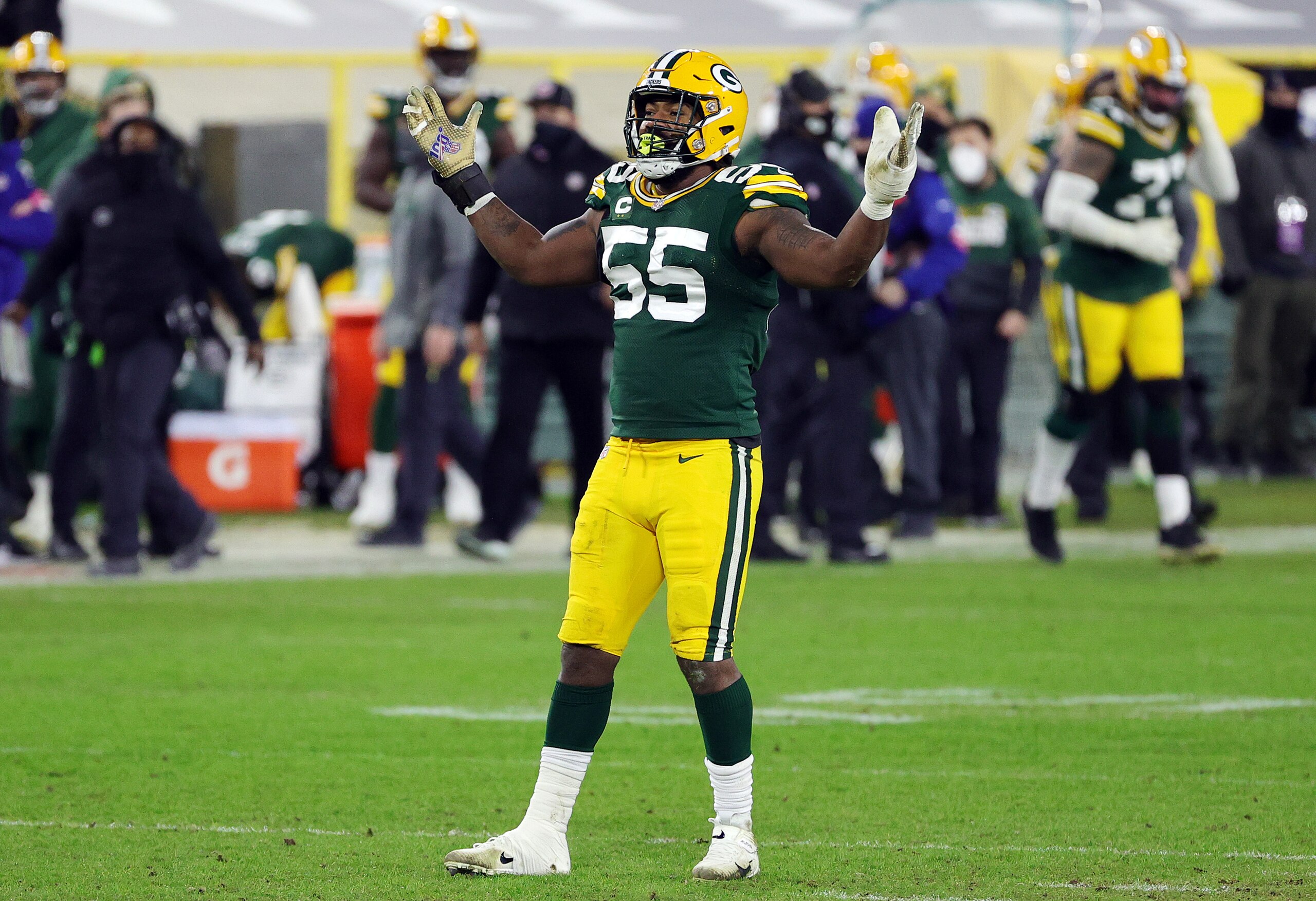 GREEN BAY, WISCONSIN - JANUARY 16: Za'Darius Smith #55 of the Green Bay Packers reacts in the fourth quarter against the Los Angeles Rams during the NFC Divisional Playoff game at Lambeau Field on January 16, 2021 in Green Bay, Wisconsin. (Photo by Stacy Revere/Getty Images)