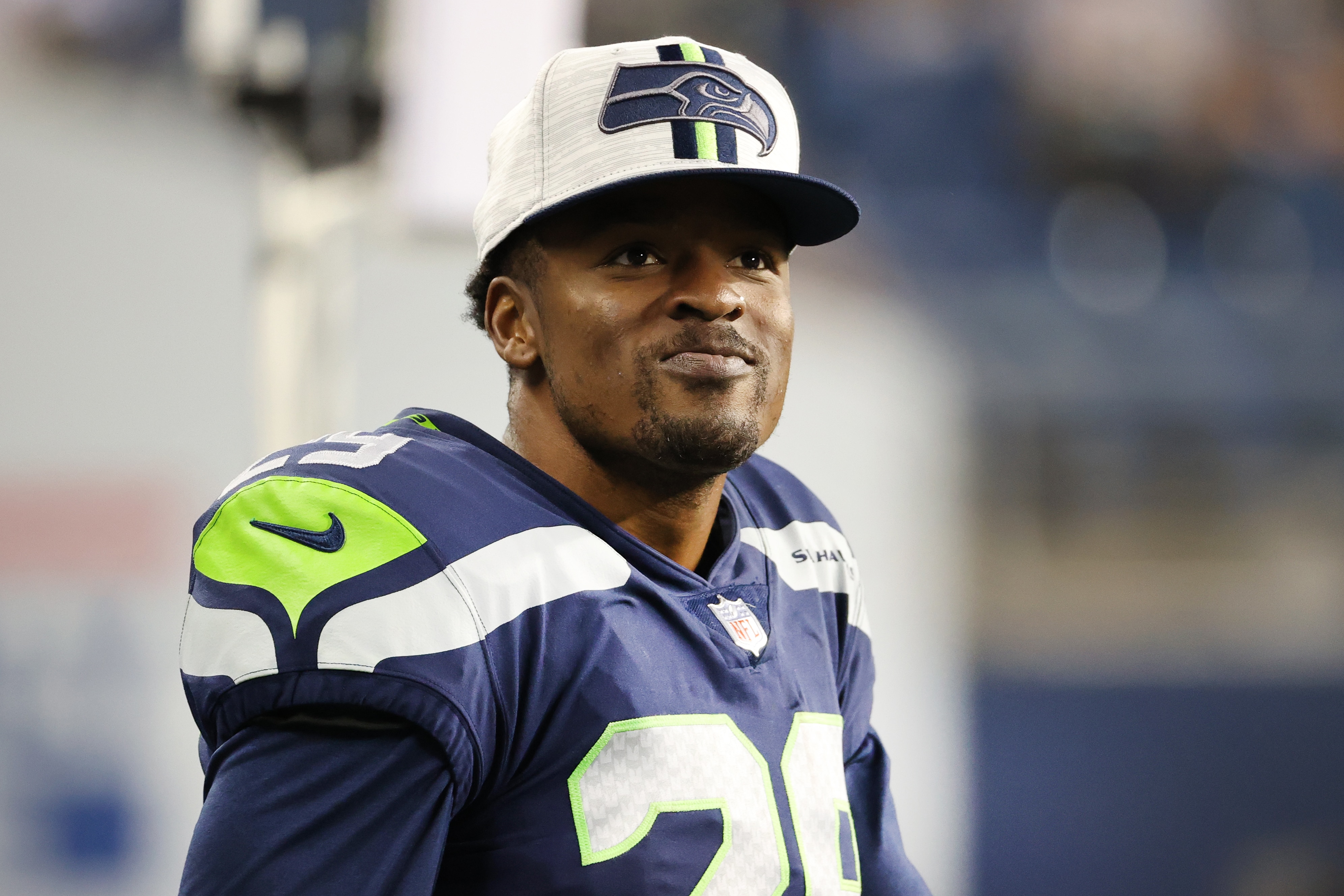SEATTLE, WASHINGTON - AUGUST 28: D.J. Reed #29 of the Seattle Seahawks looks on in the second quarter during the NFL preseason game against the Los Angeles Chargers at Lumen Field on August 28, 2021 in Seattle, Washington. (Photo by Abbie Parr/Getty Images)