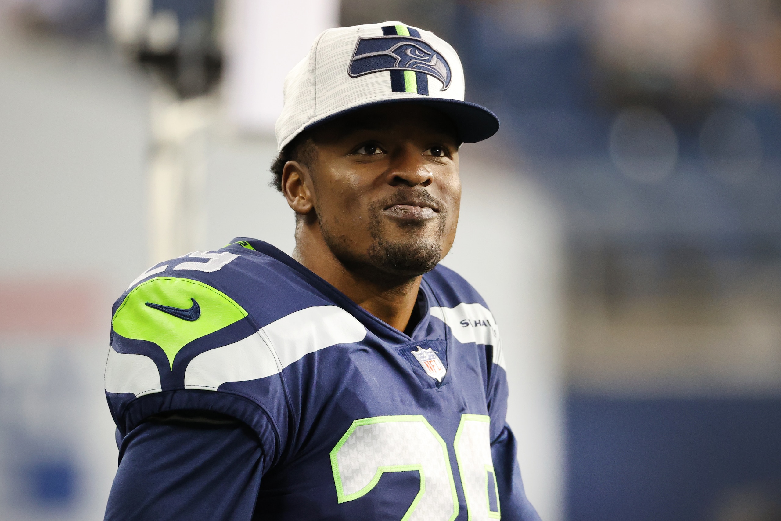 SEATTLE, WASHINGTON - AUGUST 28: D.J. Reed #29 of the Seattle Seahawks looks on in the second quarter during the NFL preseason game against the Los Angeles Chargers at Lumen Field on August 28, 2021 in Seattle, Washington. (Photo by Abbie Parr/Getty Images)