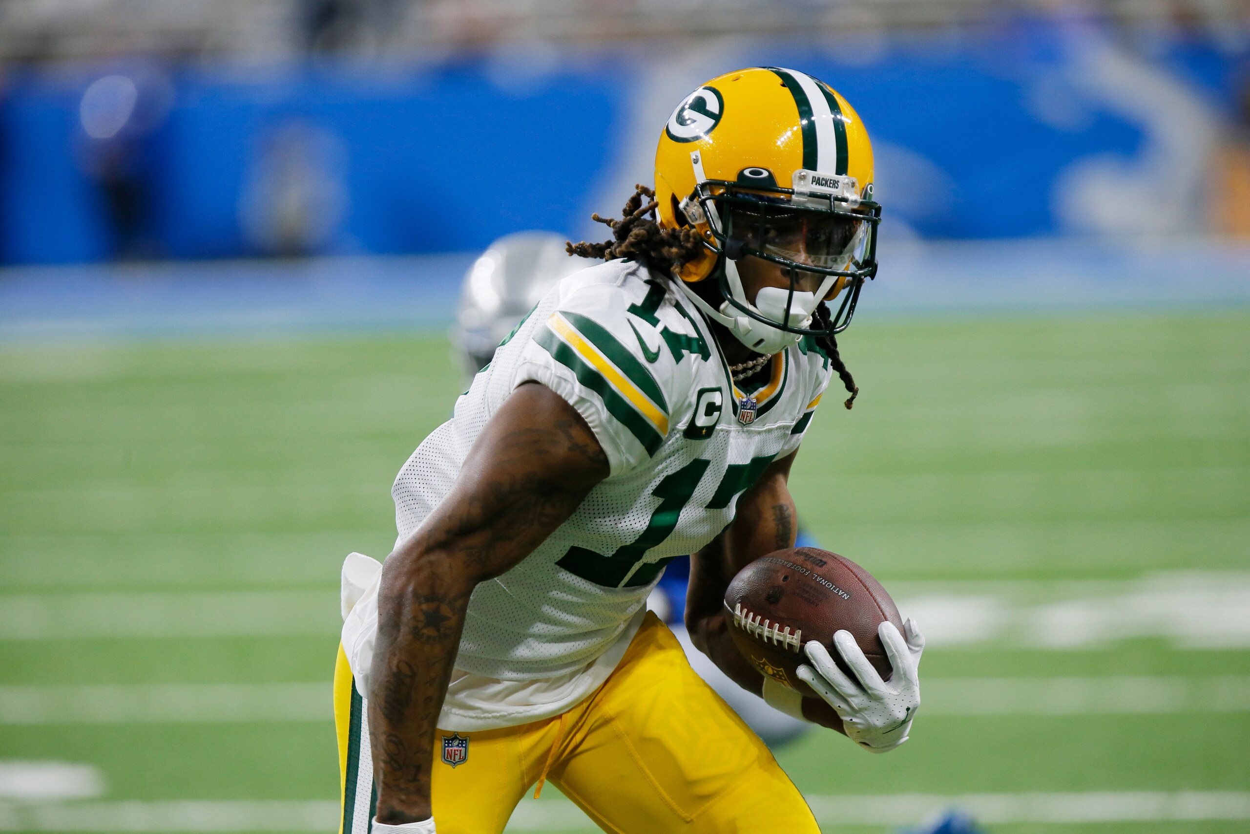 Green Bay Packers wide receiver Davante Adams runs during the first half of an NFL football game against the Detroit Lions, Sunday, Jan. 9, 2022, in Detroit. (AP Photo/Duane Burleson)