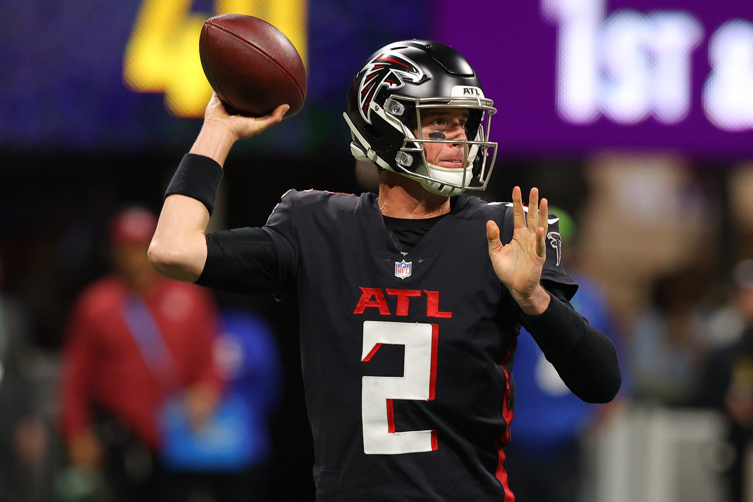 ATLANTA, GEORGIA - JANUARY 09: Matt Ryan #2 of the Atlanta Falcons passes during the fourth quarter in the game against the New Orleans Saints at Mercedes-Benz Stadium on January 09, 2022 in Atlanta, Georgia. (Photo by Todd Kirkland/Getty Images)