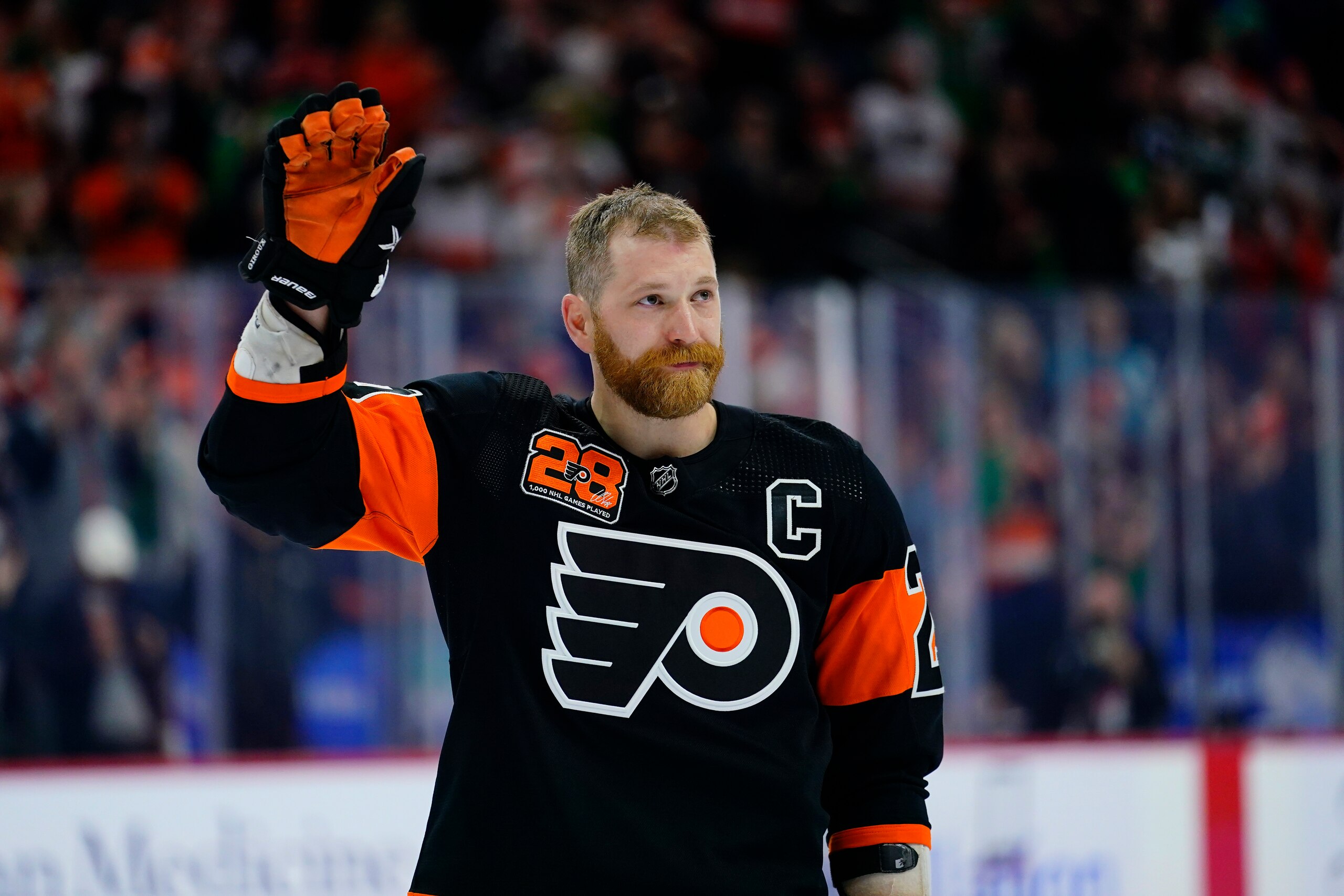 Philadelphia Flyers' Claude Giroux acknowledges the crowd after playing in his 1000th NHL hockey game, Thursday, March 17, 2022, in Philadelphia. (AP Photo/Matt Slocum) Philadelphia Flyers' Claude Giroux acknowledges the crowd after playing in his 1000th NHL hockey game, Thursday, March 17, 2022, in Philadelphia. (AP Photo/Matt Slocum)