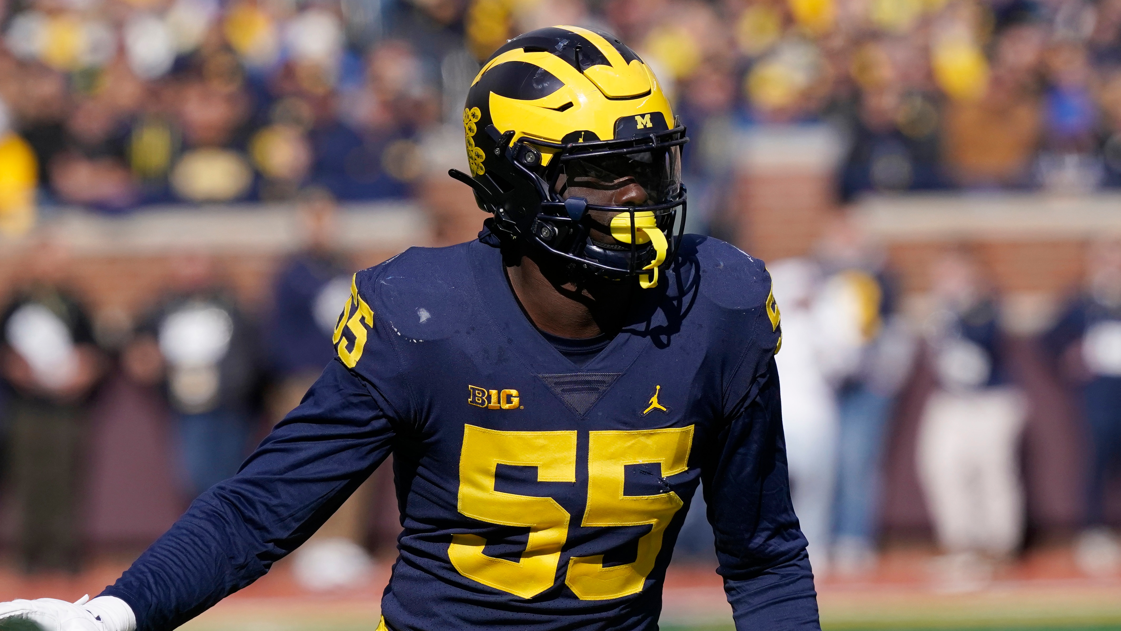 Michigan linebacker David Ojabo plays during the first half of an NCAA college football game, Saturday, Oct. 23, 2021, in Ann Arbor, Mich. (AP Photo/Carlos Osorio)