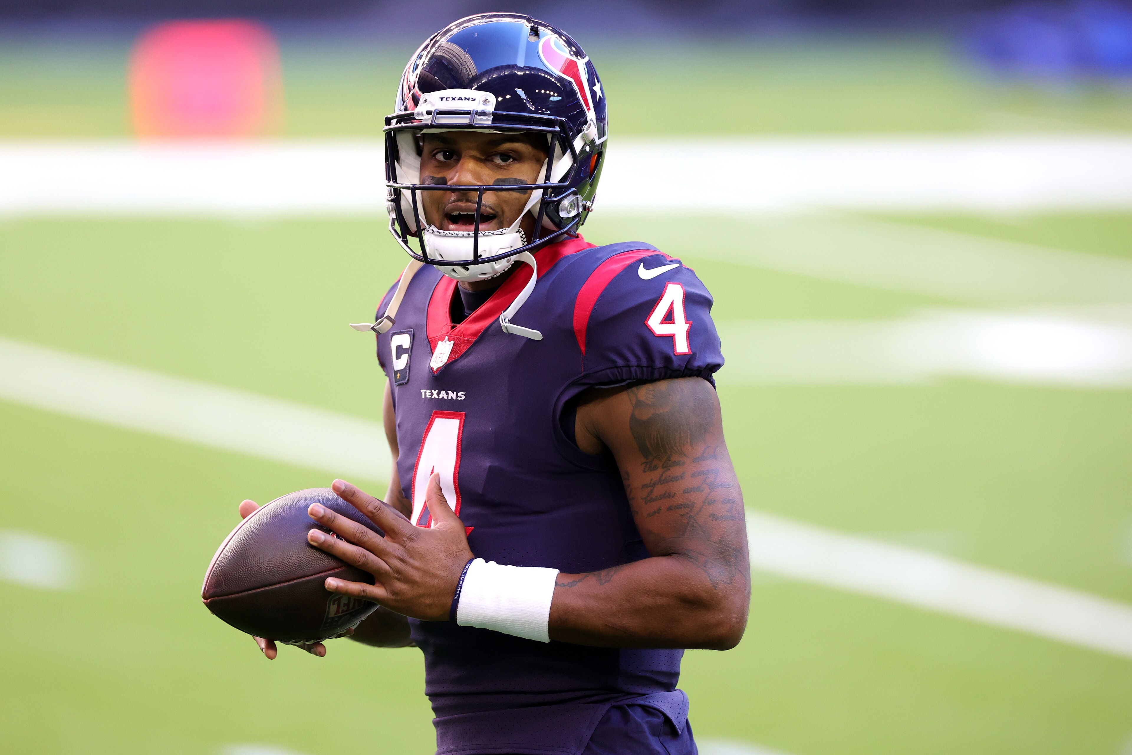 HOUSTON, TEXAS - JANUARY 03: Deshaun Watson #4 of the Houston Texans in action against the Tennessee Titans during a game at NRG Stadium on January 03, 2021 in Houston, Texas. (Photo by Carmen Mandato/Getty Images) HOUSTON, TEXAS - JANUARY 03: Deshaun Watson #4 of the Houston Texans in action against the Tennessee Titans during a game at NRG Stadium on January 03, 2021 in Houston, Texas. (Photo by Carmen Mandato/Getty Images)