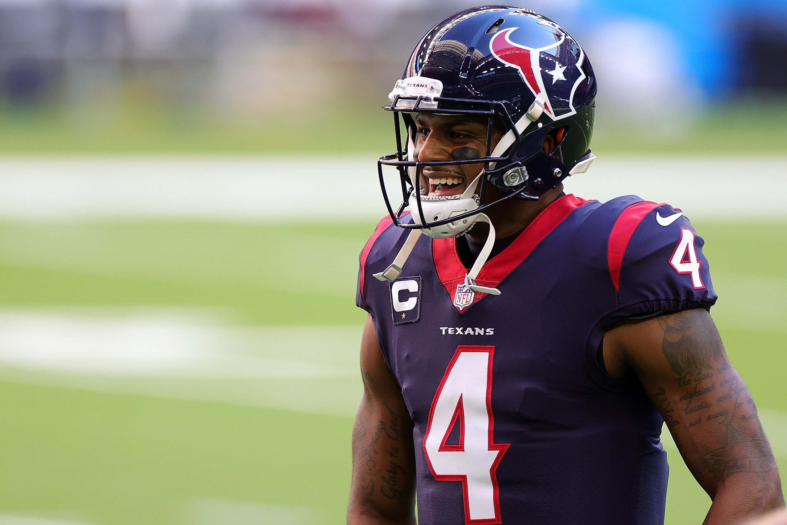 HOUSTON, TEXAS - JANUARY 03: Deshaun Watson #4 of the Houston Texans participates in warmups prior to a game against the Tennessee Titans at NRG Stadium on January 03, 2021 in Houston, Texas. (Photo by Carmen Mandato/Getty Images)