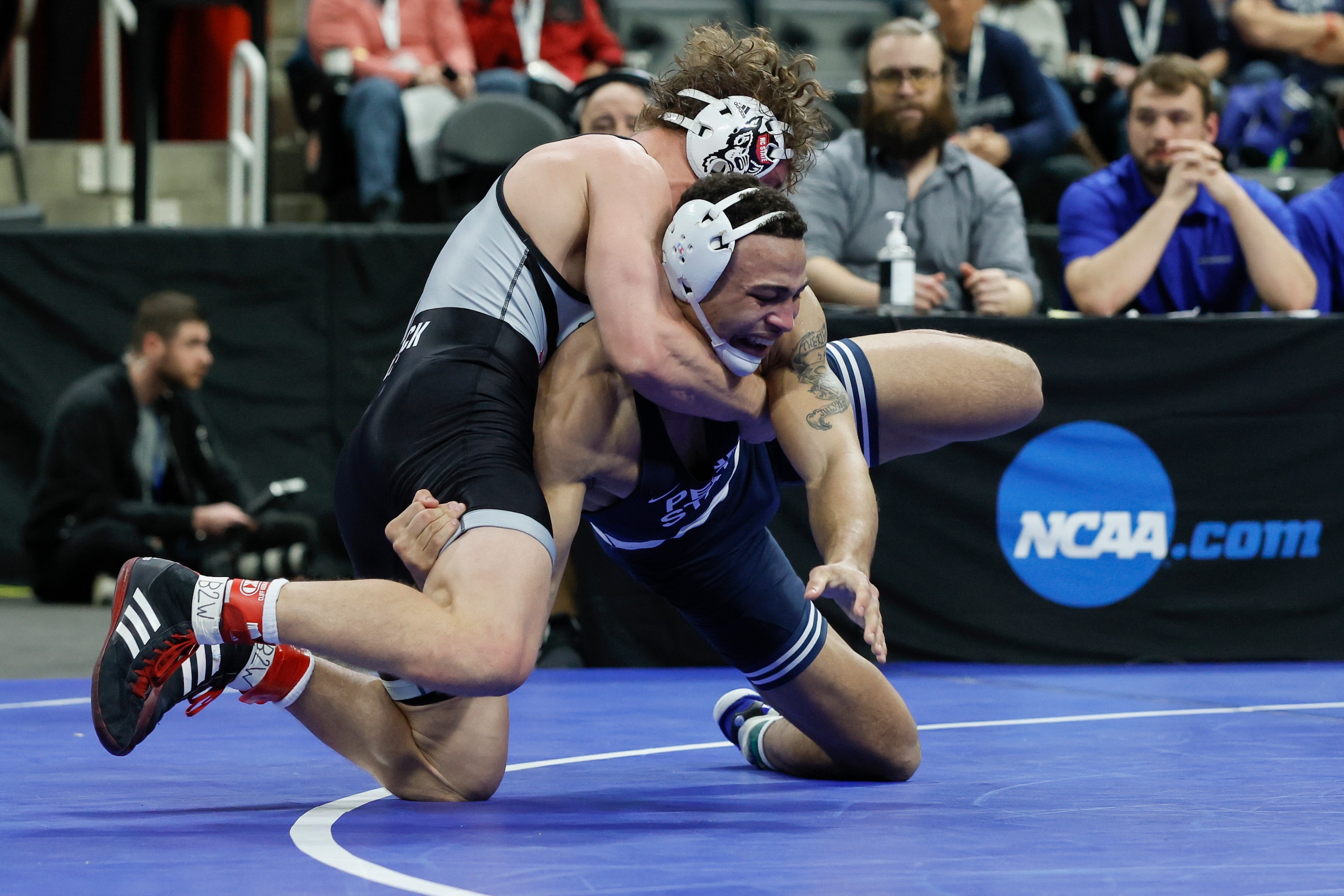DETROIT, MI - MARCH 18: Aaron Brooks of the Penn State Nittany Lions wrestles Trent Hidlay of the NC State Wolfpack in the 184-pound semifinal match during the Division I Mens Wrestling Championship held at Little Caesars Arena on March 18, 2022 in Detroit, Michigan. (Photo by Jay LaPrete/NCAA Photos/NCAA Photos via Getty Images)