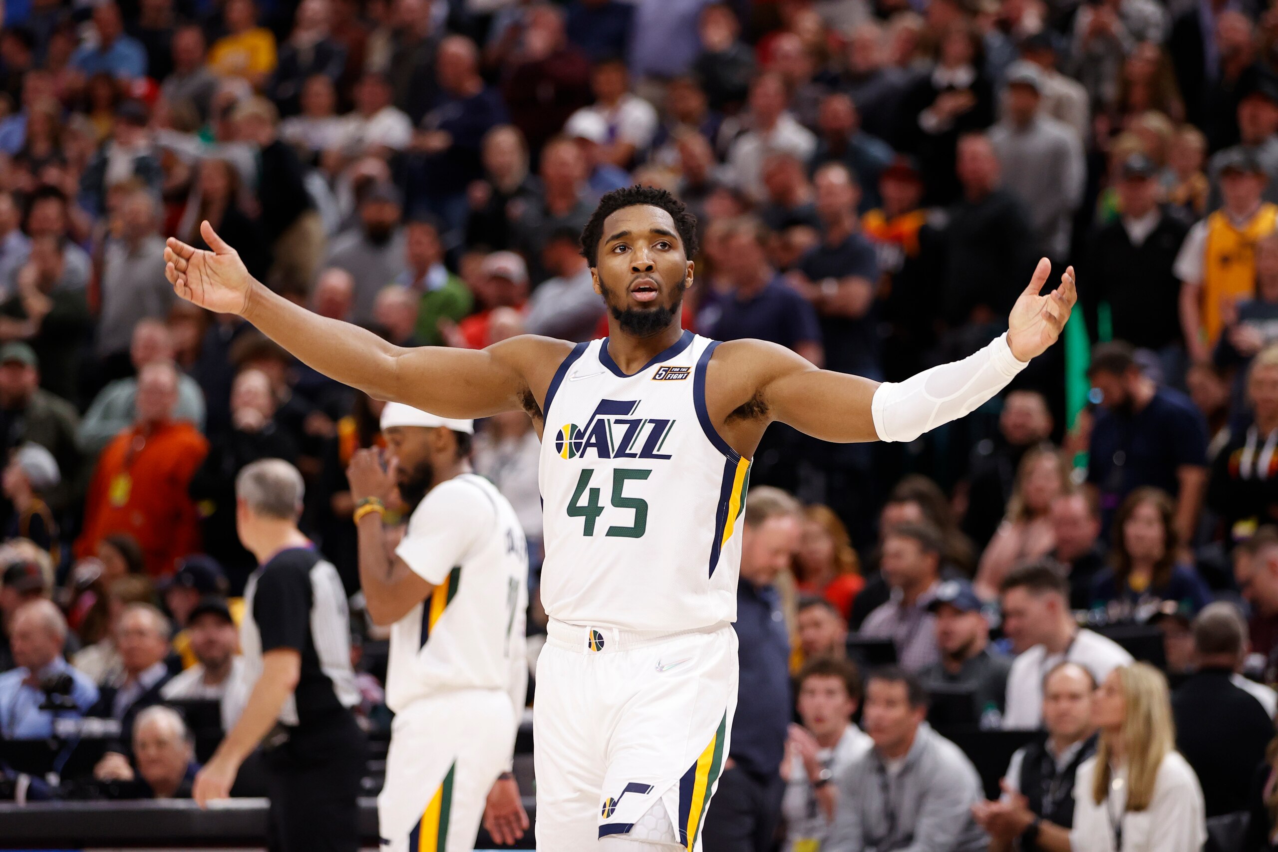SALT LAKE CITY, UT - MARCH 14: Donovan Mitchell #45 of the Utah Jazz celebrates during the game against the Milwaukee Bucks on March 14, 2022 at vivint.SmartHome Arena in Salt Lake City, Utah. NOTE TO USER: User expressly acknowledges and agrees that, by downloading and or using this Photograph, User is consenting to the terms and conditions of the Getty Images License Agreement. Mandatory Copyright Notice: Copyright 2022 NBAE (Photo by Jeff Swinger/NBAE via Getty Images)