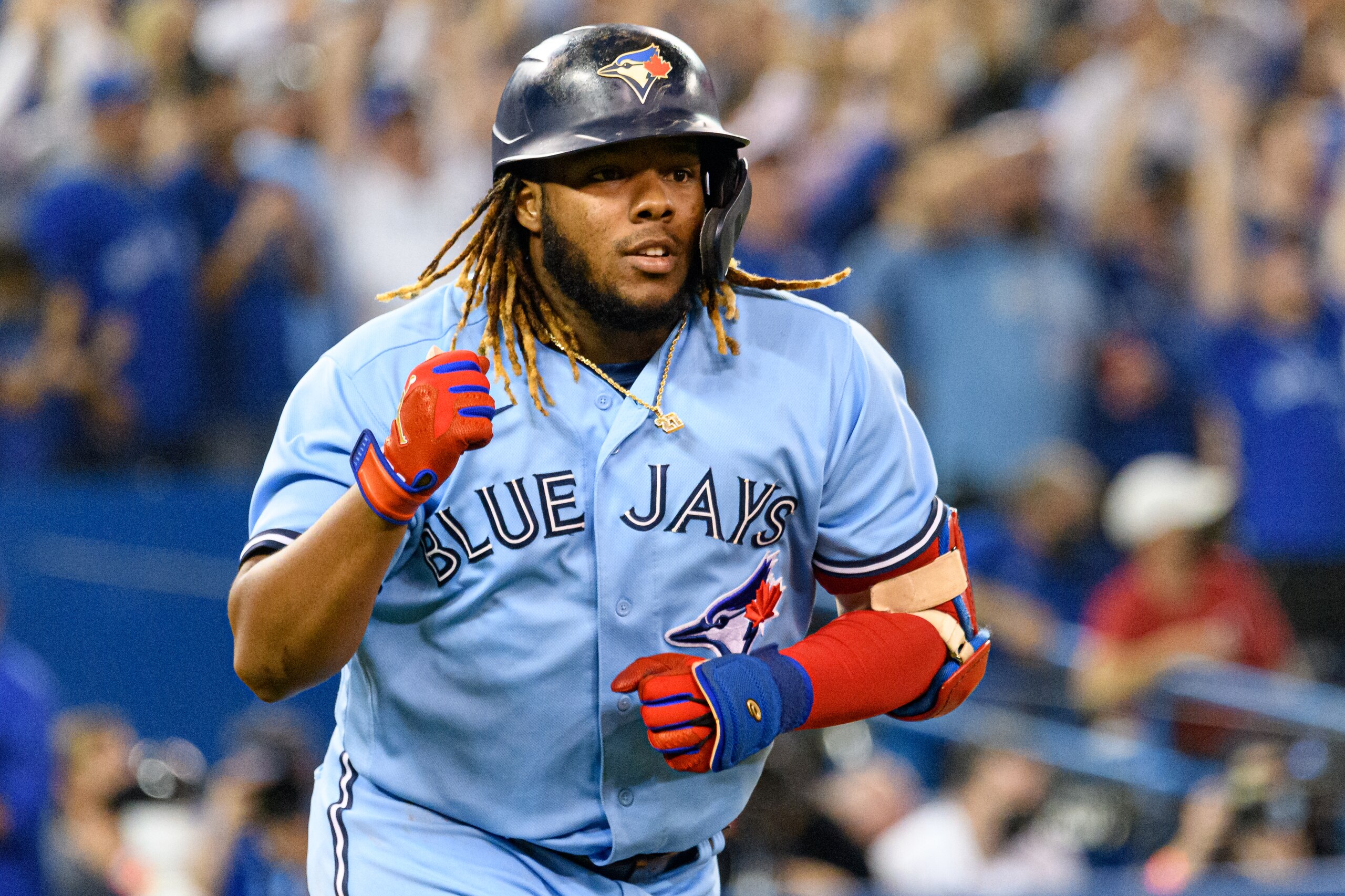 TORONTO, ON - OCTOBER 03: Toronto Blue Jays First base Vladimir Guerrero Jr. (27) celebrates his homerun during the MLB baseball regular season game between the Baltimore Orioles and the Toronto Blue Jays on October 3, 2021, at Rogers Centre in Toronto, ON, Canada. (Photo by Julian Avram/Icon Sportswire via Getty Images)