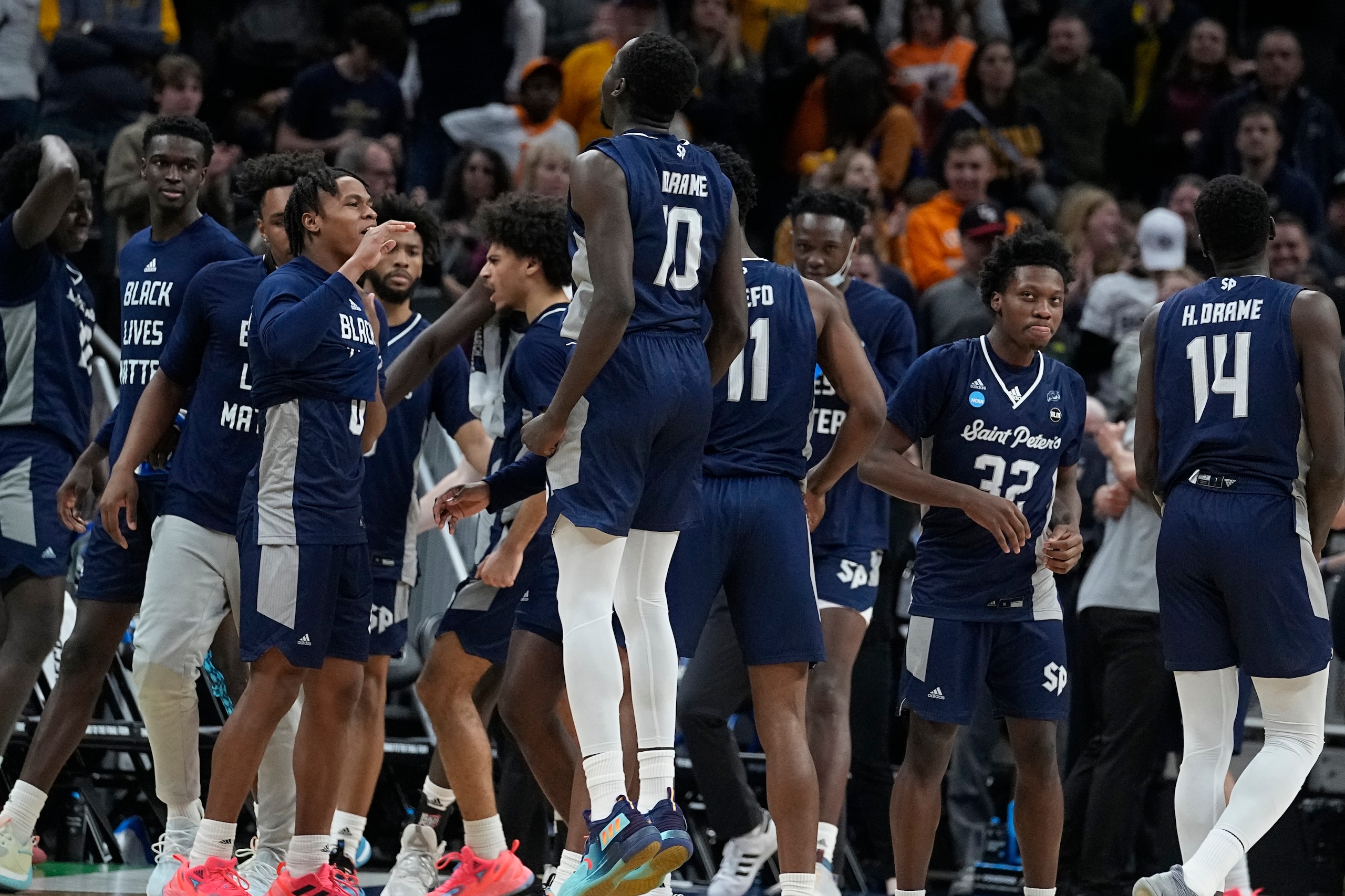 Saint Peter's players celebrate after defeating Murray State in a college basketball game in the second round of the NCAA tournament, Saturday, March 19, 2022, in Indianapolis. (AP Photo/Darron Cummings) Saint Peter's players celebrate after defeating Murray State in a college basketball game in the second round of the NCAA tournament, Saturday, March 19, 2022, in Indianapolis. (AP Photo/Darron Cummings)