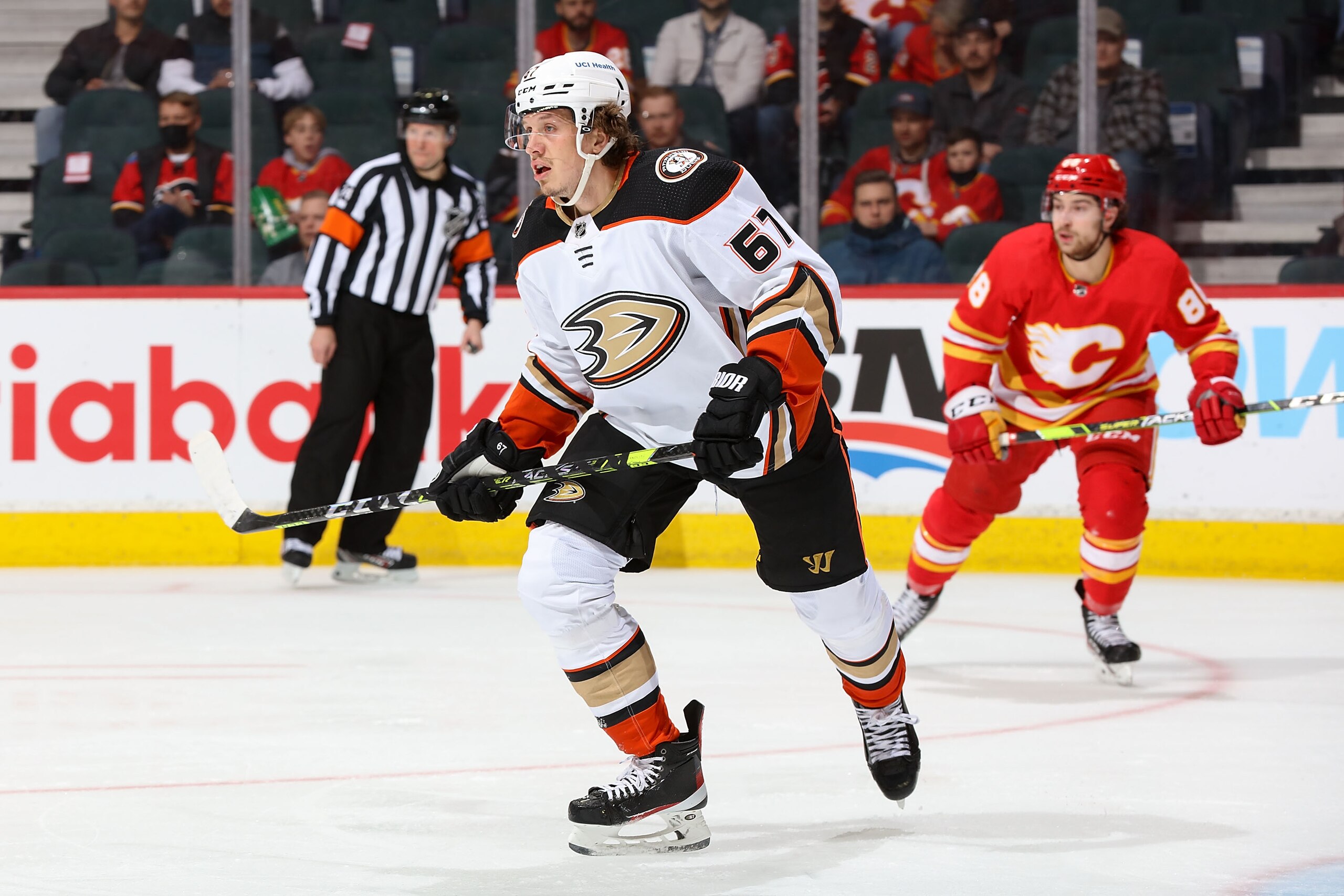 CALGARY, AB - FEBRUARY 16: Rickard Rakell #67 of the Anaheim Ducks skates up ice against the Calgary Flames at Scotiabank Saddledome on February 16, 2022 in Calgary, Alberta, Canada. (Photo by Gerry Thomas/NHLI via Getty Images)