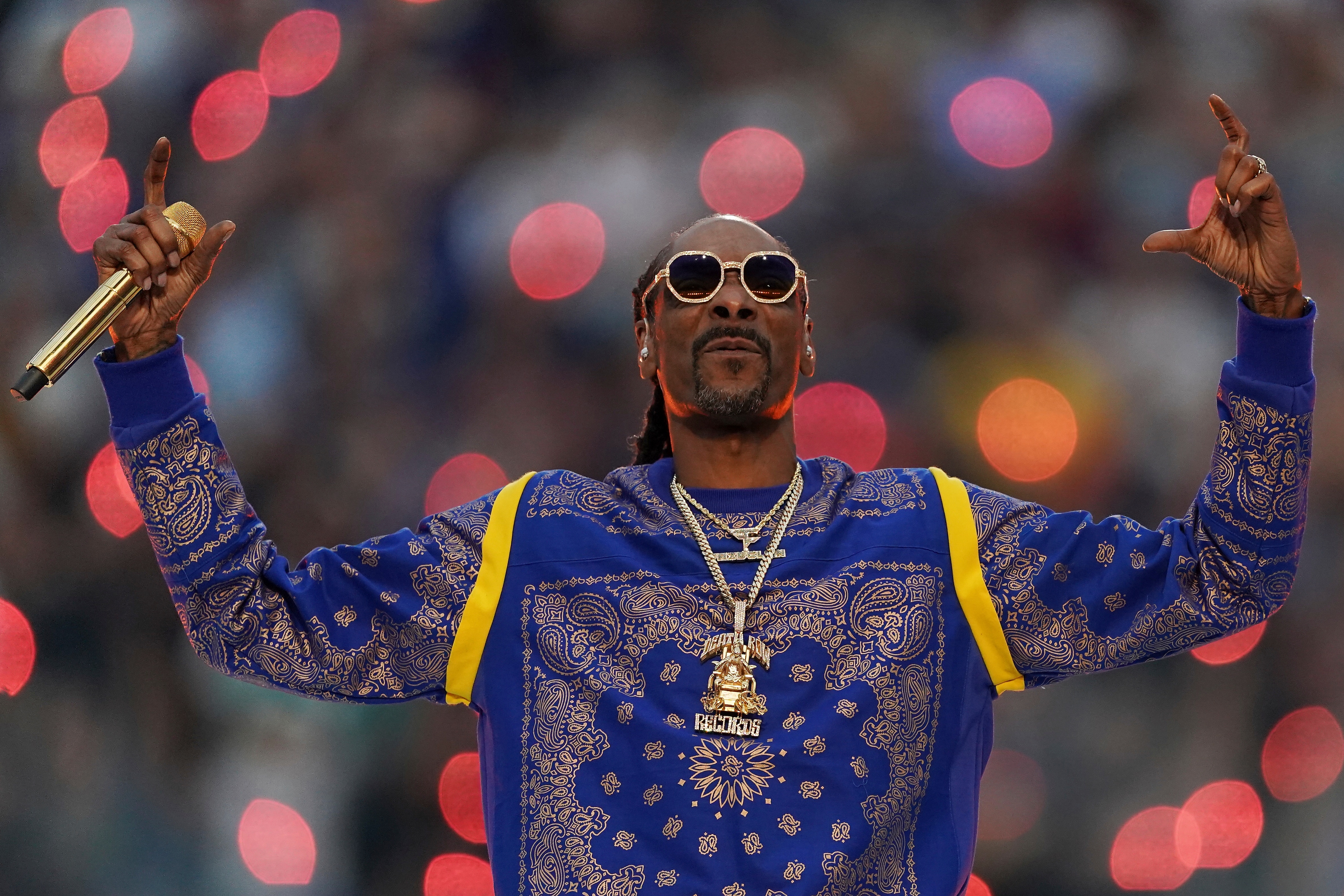 Snoop Dogg performs during halftime of the game between the Los Angeles Rams and Cincinnati Bengals in Super Bowl 56, Sunday, Feb. 13, 2022 in Inglewood, Calif. (AP Photo/Doug Benc)