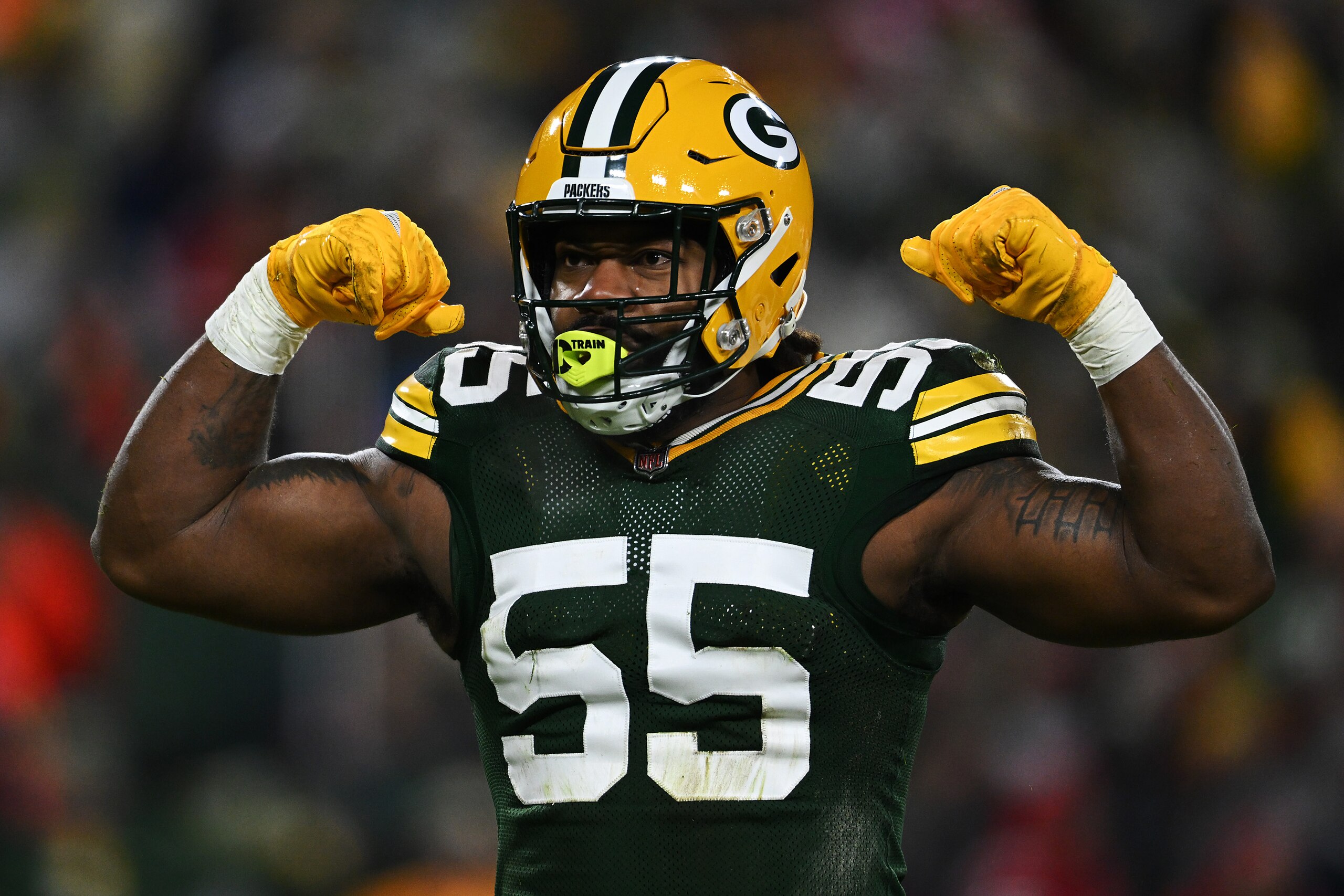 GREEN BAY, WISCONSIN - JANUARY 22:  Outside linebacker Za'Darius Smith #55 of the Green Bay Packers celebrates after a sack during the 1st quarter of the NFC Divisional Playoff game against the San Francisco 49ersat Lambeau Field on January 22, 2022 in Green Bay, Wisconsin. (Photo by Quinn Harris/Getty Images)