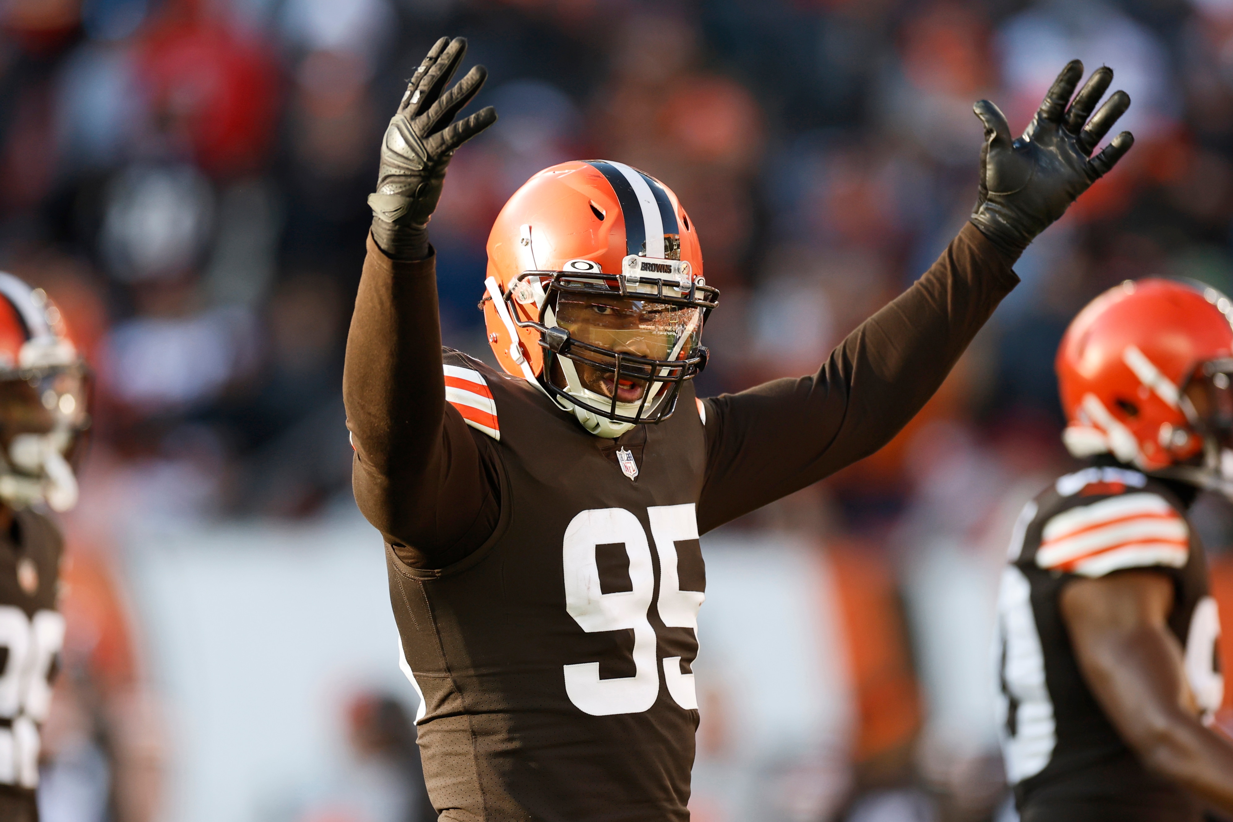 Cleveland Browns defensive end Myles Garrett reacts during the second half of an NFL football game against the Baltimore Ravens, Sunday, Dec. 12, 2021, in Cleveland. (AP Photo/Ron Schwane)