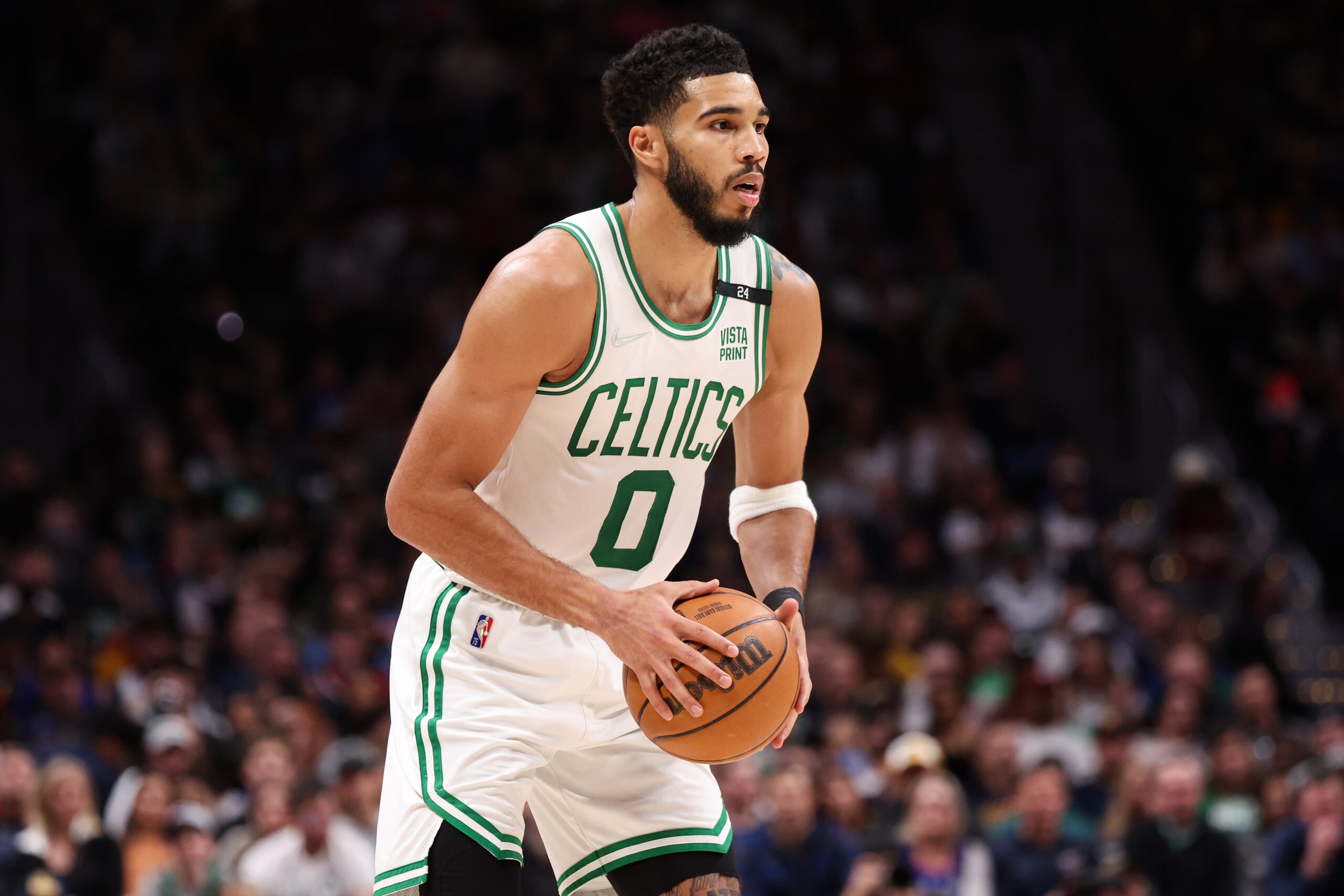 DENVER, CO - MARCH 20: Jayson Tatum #0 of the Boston Celtics looks to pass against the Denver Nuggets at Ball Arena on March 20, 2022 in Denver, Colorado. NOTE TO USER: User expressly acknowledges and agrees that, by downloading and or using this photograph,  User is consenting to the terms and conditions of the Getty Images License Agreement. (Photo by Ethan Mito/Clarkson Creative/Getty Images)