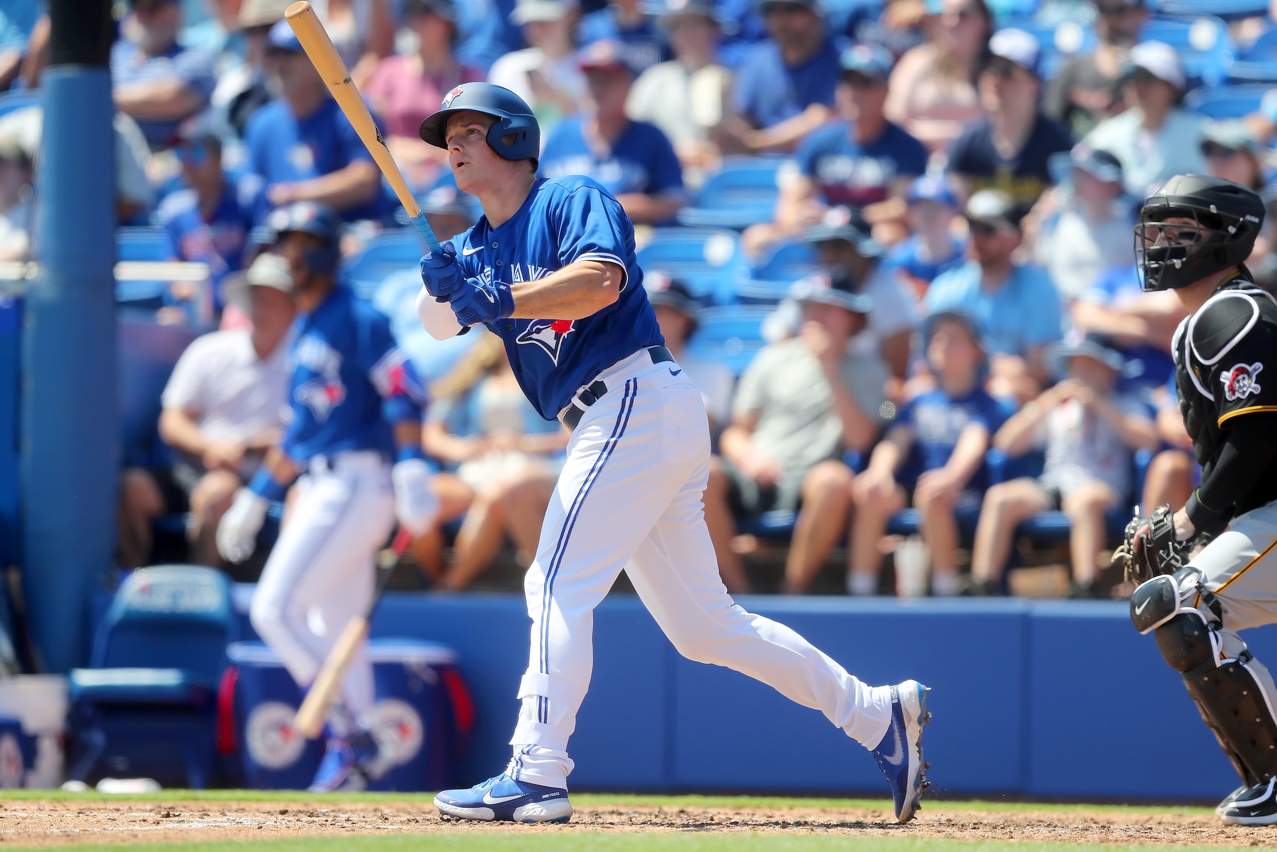 DUNEDIN, FL - MARCH 20: Toronto Blue Jays third baseman Matt Chapman (26) watches the baseball sail over the outfield fence for a home run during the spring training game between the Pittsburgh Pirates and the Toronto Blue Jays on March 20, 2022, at the Dunedin Stadium in Dunedin, FL. (Photo by Cliff Welch/Icon Sportswire via Getty Images)