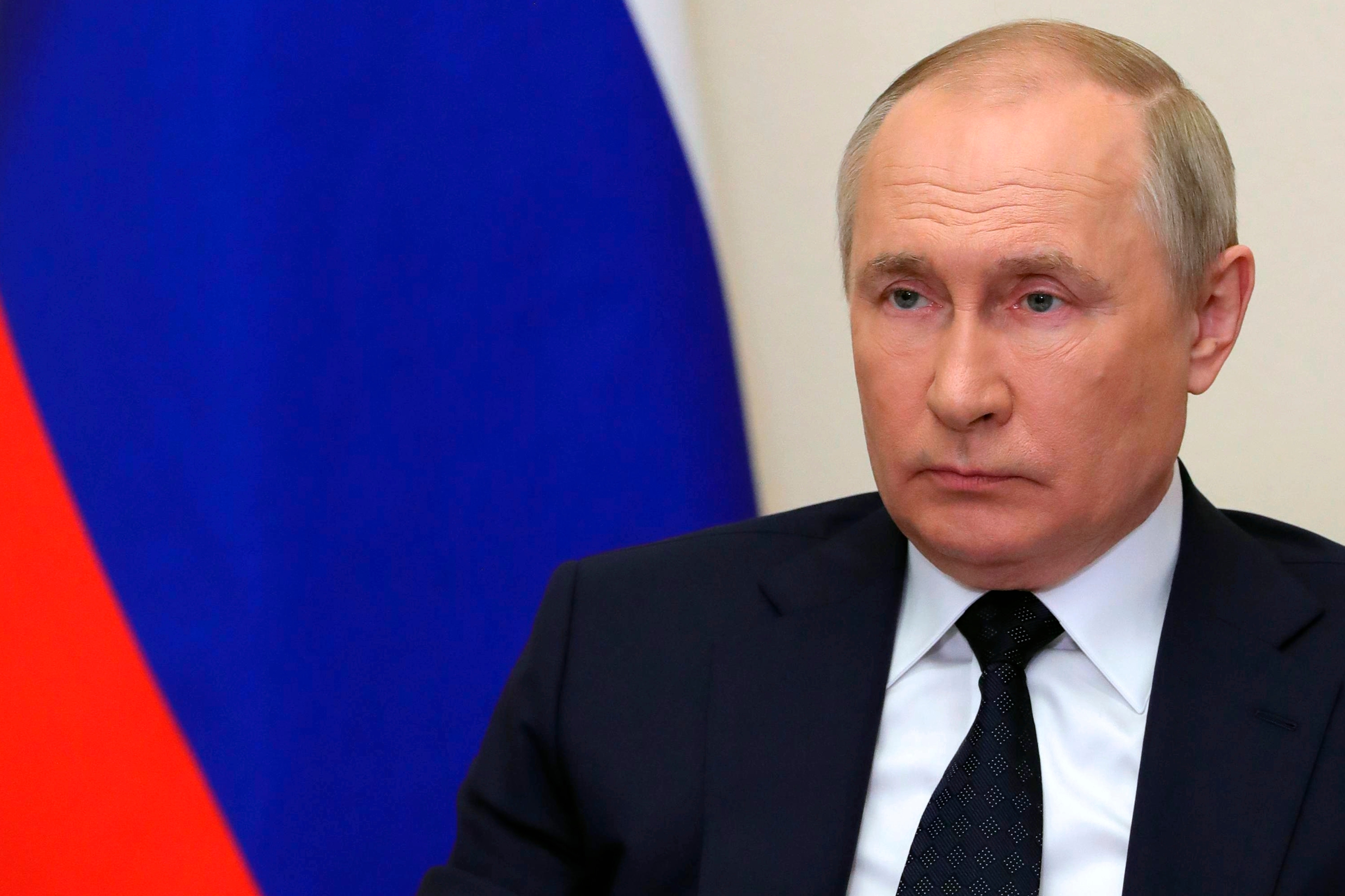 Russian President Vladimir Putin attends a cabinet meeting via videoconference at the Novo-Ogaryovo residence outside Moscow, Russia, Wednesday, March 23, 2022. (Mikhail Klimentyev, Sputnik, Kremlin Pool Photo via AP)