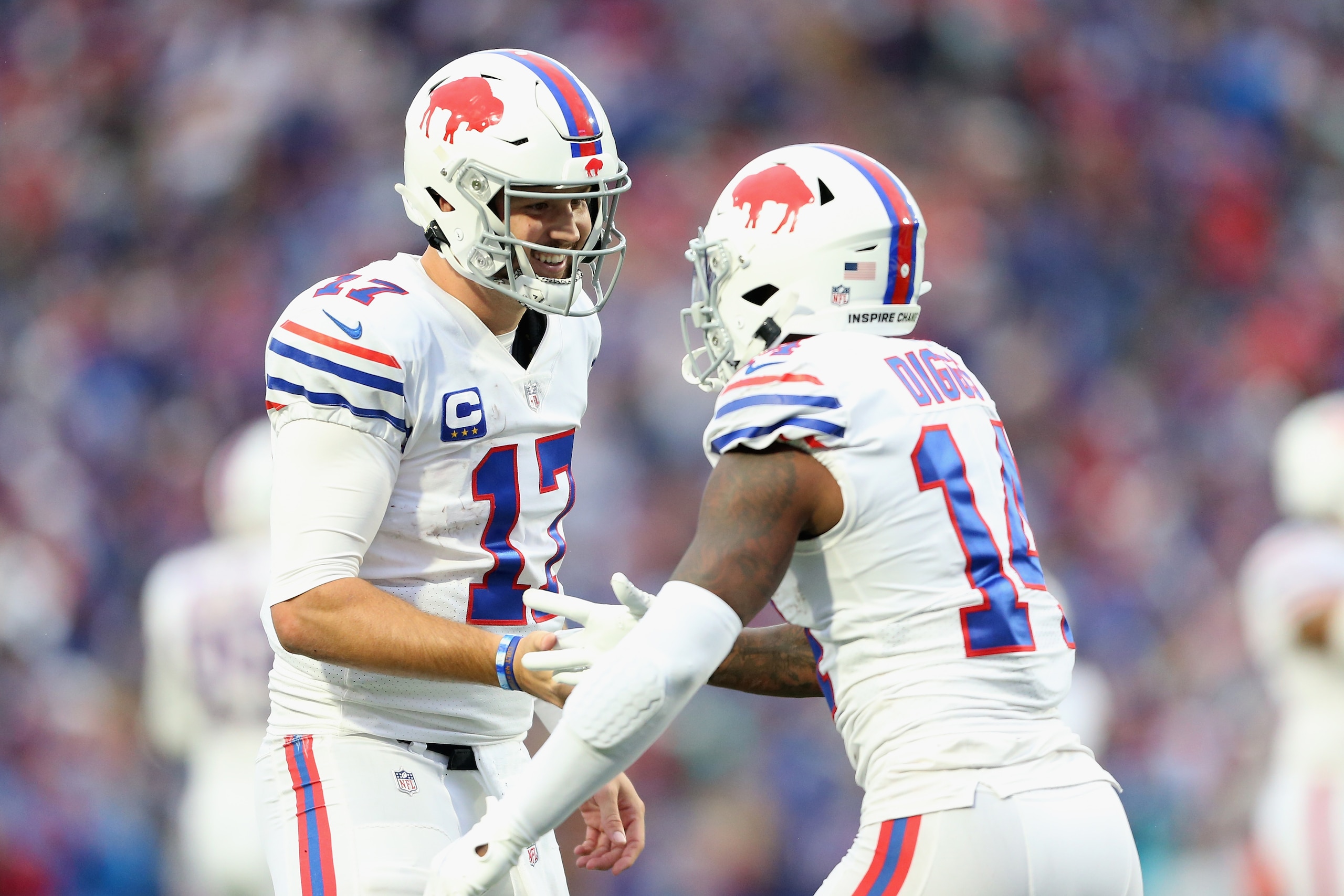 ORCHARD PARK, NEW YORK - OCTOBER 31: Josh Allen #17 and Stefon Diggs #14 of the Buffalo Bills celebrate after scoring a touchdown in the fourth quarter against the Miami Dolphins at Highmark Stadium on October 31, 2021 in Orchard Park, New York. (Photo by Joshua Bessex/Getty Images) ORCHARD PARK, NEW YORK - OCTOBER 31: Josh Allen #17 and Stefon Diggs #14 of the Buffalo Bills celebrate after scoring a touchdown in the fourth quarter against the Miami Dolphins at Highmark Stadium on October 31, 2021 in Orchard Park, New York. (Photo by Joshua Bessex/Getty Images)