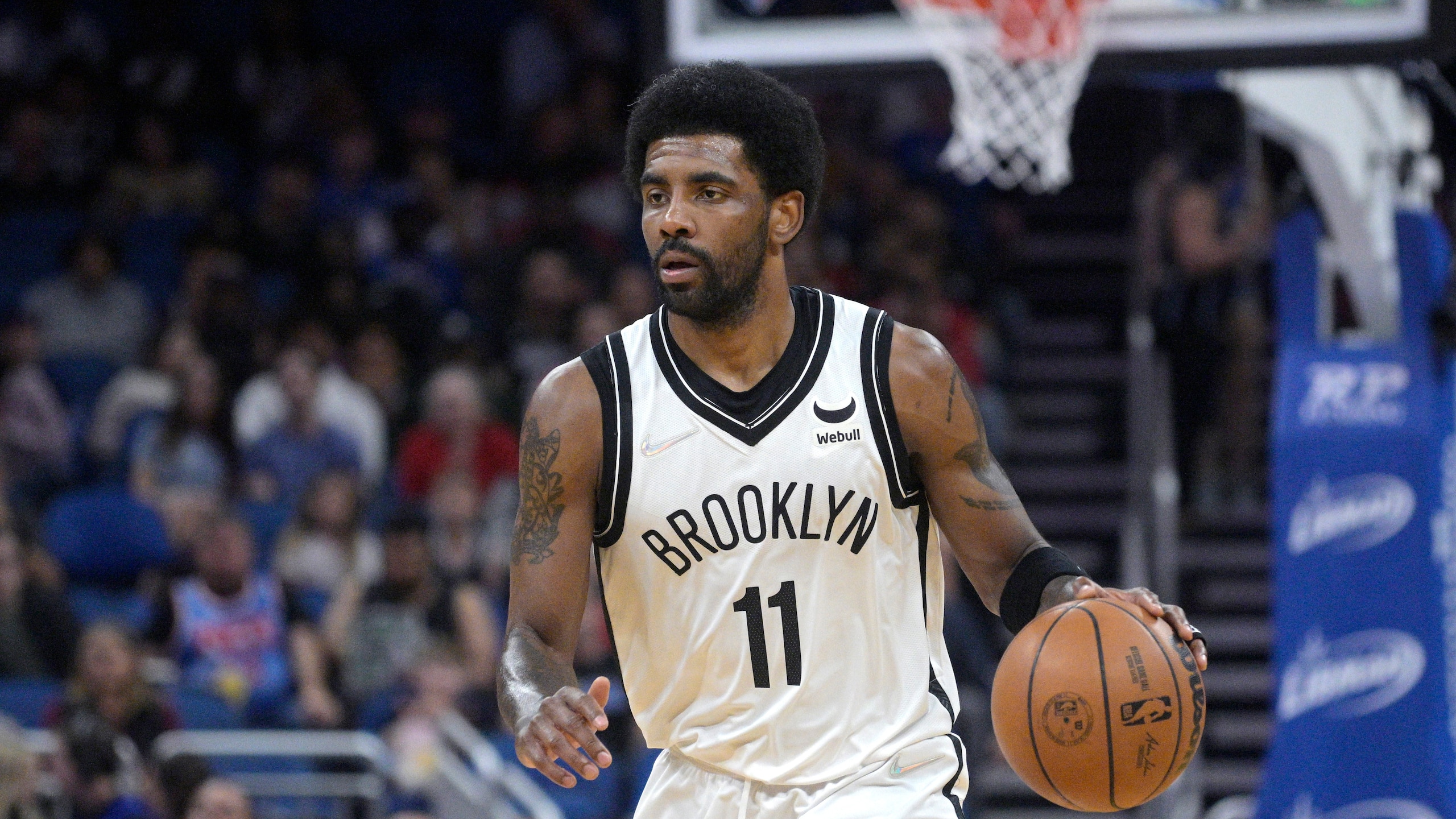 Brooklyn Nets guard Kyrie Irving (11) sets up a play during the first half of an NBA basketball game against the Orlando Magic, Tuesday, March 15, 2022, in Orlando, Fla. (AP Photo/Phelan M. Ebenhack) Brooklyn Nets guard Kyrie Irving (11) sets up a play during the first half of an NBA basketball game against the Orlando Magic, Tuesday, March 15, 2022, in Orlando, Fla. (AP Photo/Phelan M. Ebenhack)