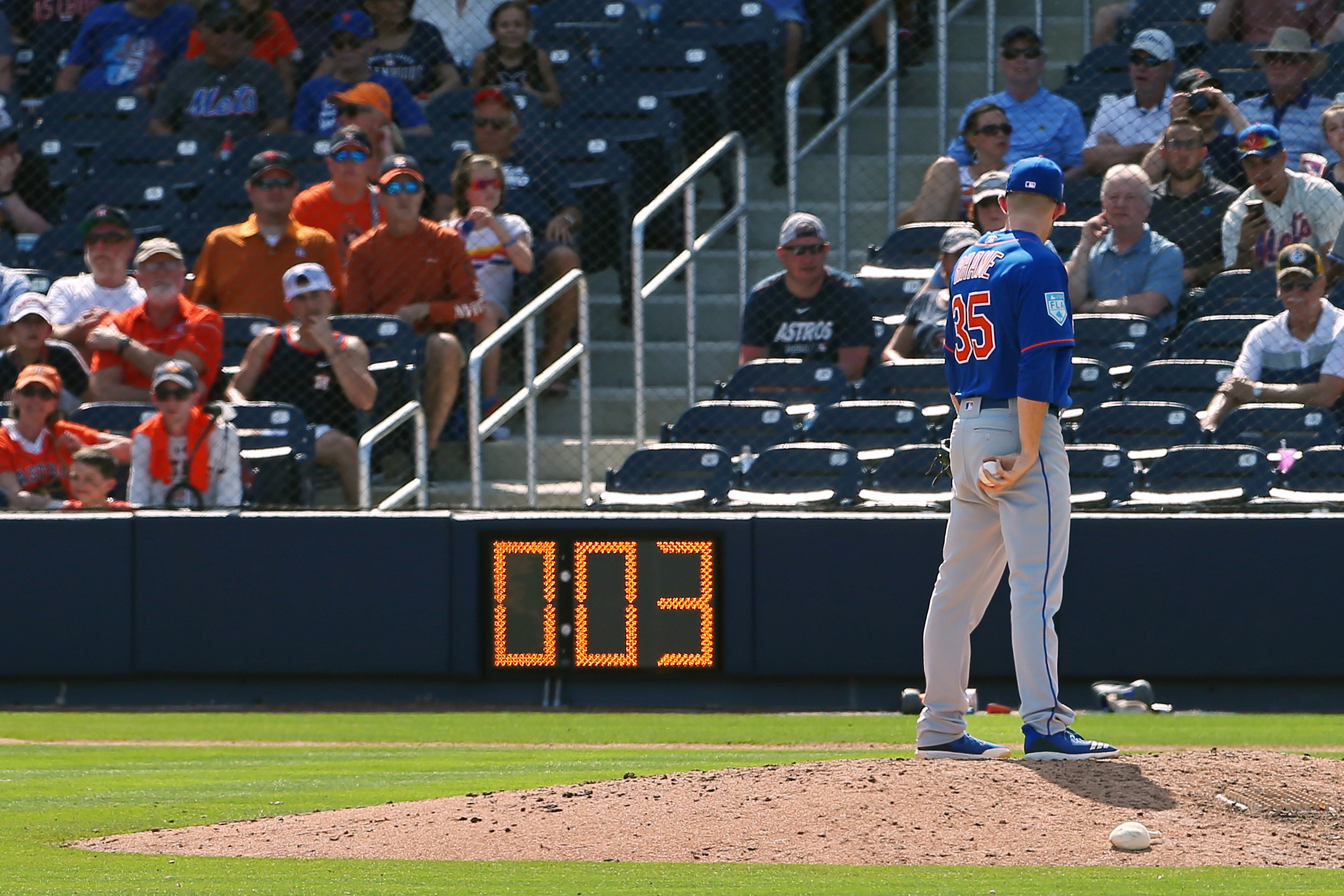 WEST PALM BEACH, FL - MARCH 11: Pitcher Jacob Rhame #35 of the New York Mets gets set to deliver a pitch as the pitch clock counts down during the ninth inning of a spring training baseball game against the Houston Astros at Fitteam Ballpark of the Palm Beaches on March 11, 2019 in West Palm Beach, Florida. The Astros defeated the Mets 6-3. (Photo by Rich Schultz/Getty Images)