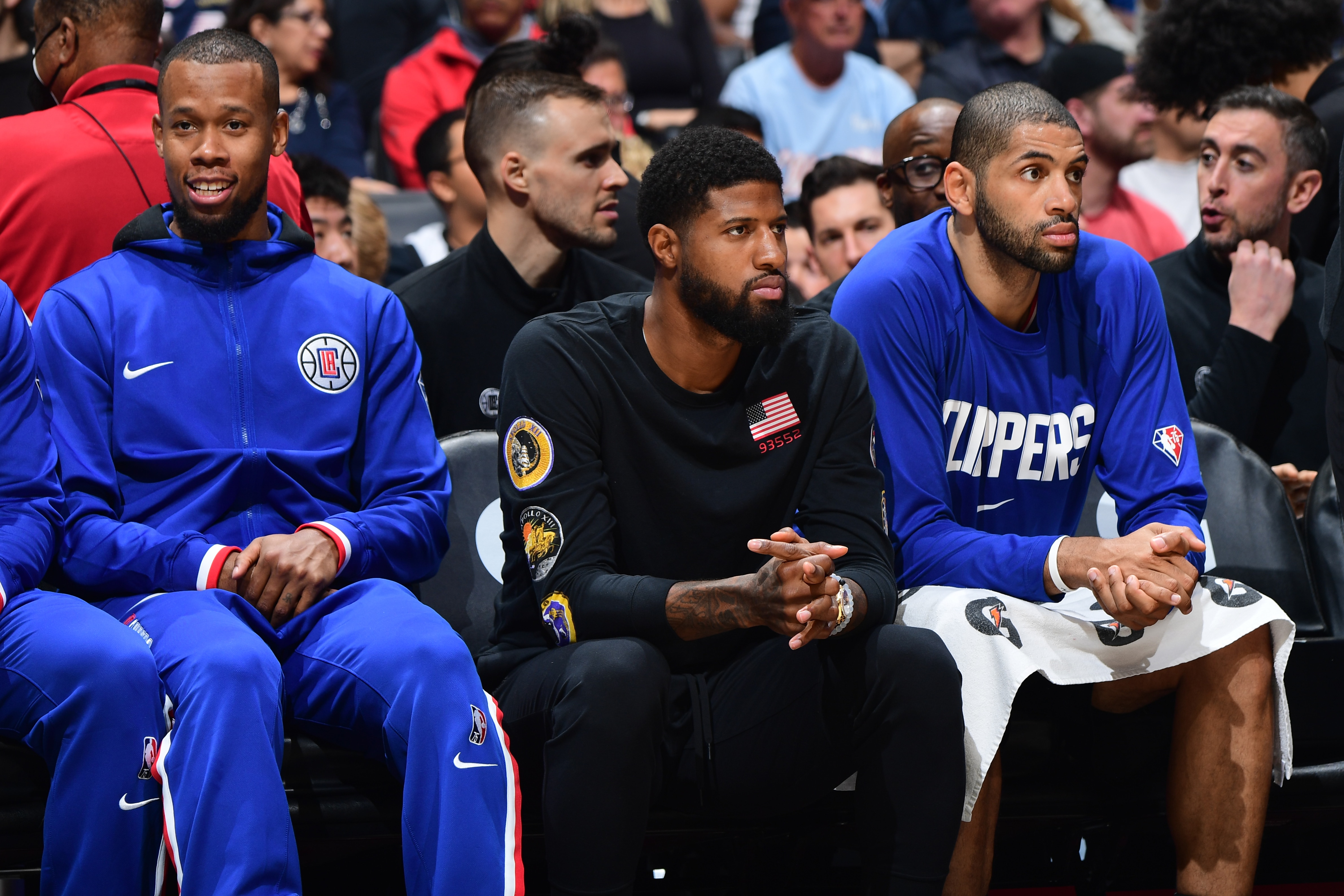 LOS ANGELES, CA - MARCH 16: Paul George #13 of the LA Clippers looks on during the game against the Toronto Raptors on March 16, 2022 at Crypto.Com Arena in Los Angeles, California. NOTE TO USER: User expressly acknowledges and agrees that, by downloading and/or using this Photograph, user is consenting to the terms and conditions of the Getty Images License Agreement. Mandatory Copyright Notice: Copyright 2022 NBAE (Photo by Adam Pantozzi/NBAE via Getty Images)