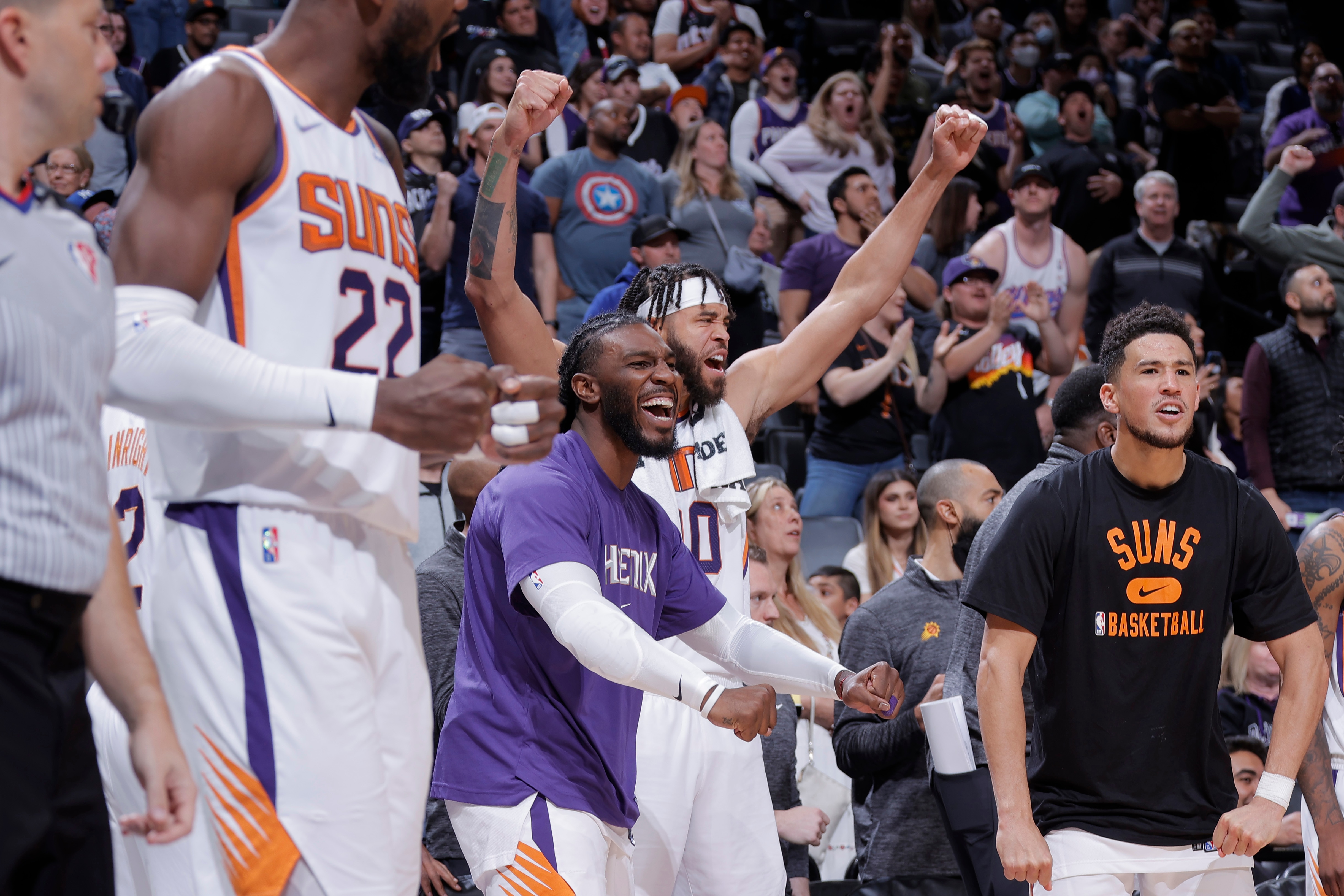 SACRAMENTO, CA - MARCH 20: Jae Crowder #99, JaVale McGee #00 and Devin Booker #1 of the Phoenix Suns celebrate during the game against the Sacramento Kings on March 20, 2022 at Golden 1 Center in Sacramento, California. NOTE TO USER: User expressly acknowledges and agrees that, by downloading and or using this Photograph, user is consenting to the terms and conditions of the Getty Images License Agreement. Mandatory Copyright Notice: Copyright 2022 NBAE (Photo by Rocky Widner/NBAE via Getty Images) SACRAMENTO, CA - MARCH 20: Jae Crowder #99, JaVale McGee #00 and Devin Booker #1 of the Phoenix Suns celebrate during the game against the Sacramento Kings on March 20, 2022 at Golden 1 Center in Sacramento, California. NOTE TO USER: User expressly acknowledges and agrees that, by downloading and or using this Photograph, user is consenting to the terms and conditions of the Getty Images License Agreement. Mandatory Copyright Notice: Copyright 2022 NBAE (Photo by Rocky Widner/NBAE via Getty Images)